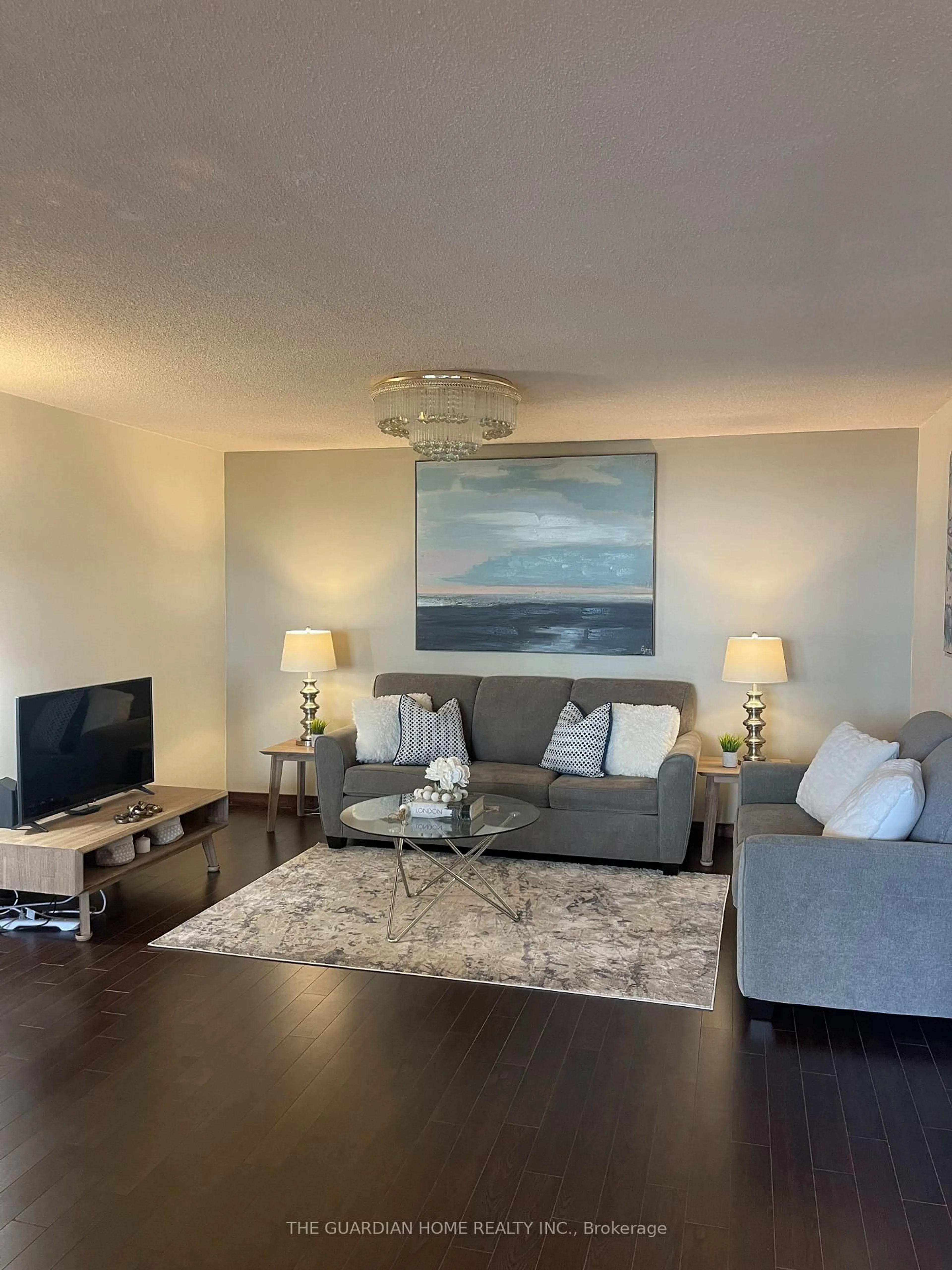 Living room with furniture, unknown for 175 bamburgh Circ #707, Toronto Ontario M1W 3X8