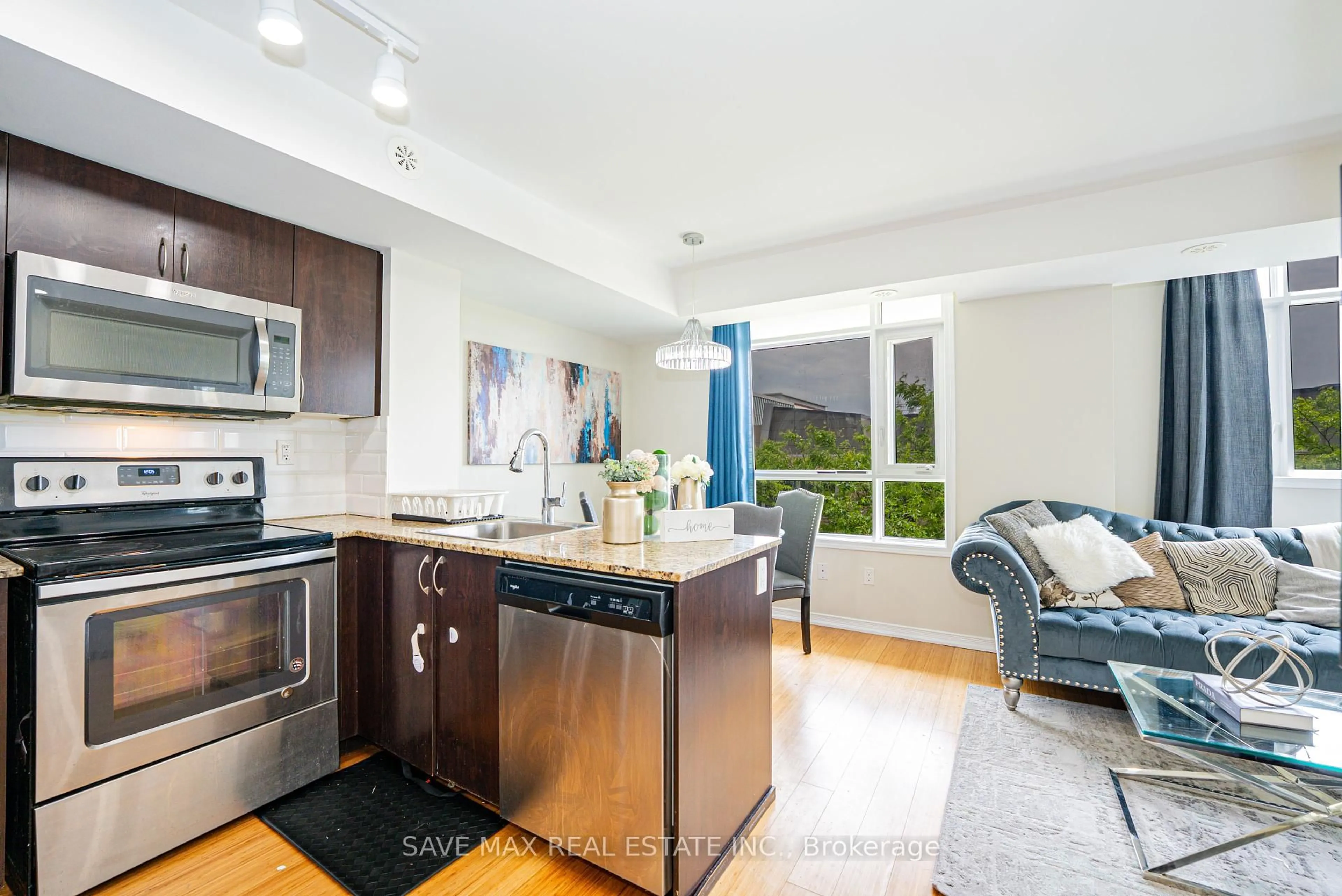Open concept kitchen, ceramic/tile floor for 1070 Progress Ave #314, Toronto Ontario M1B 0C5
