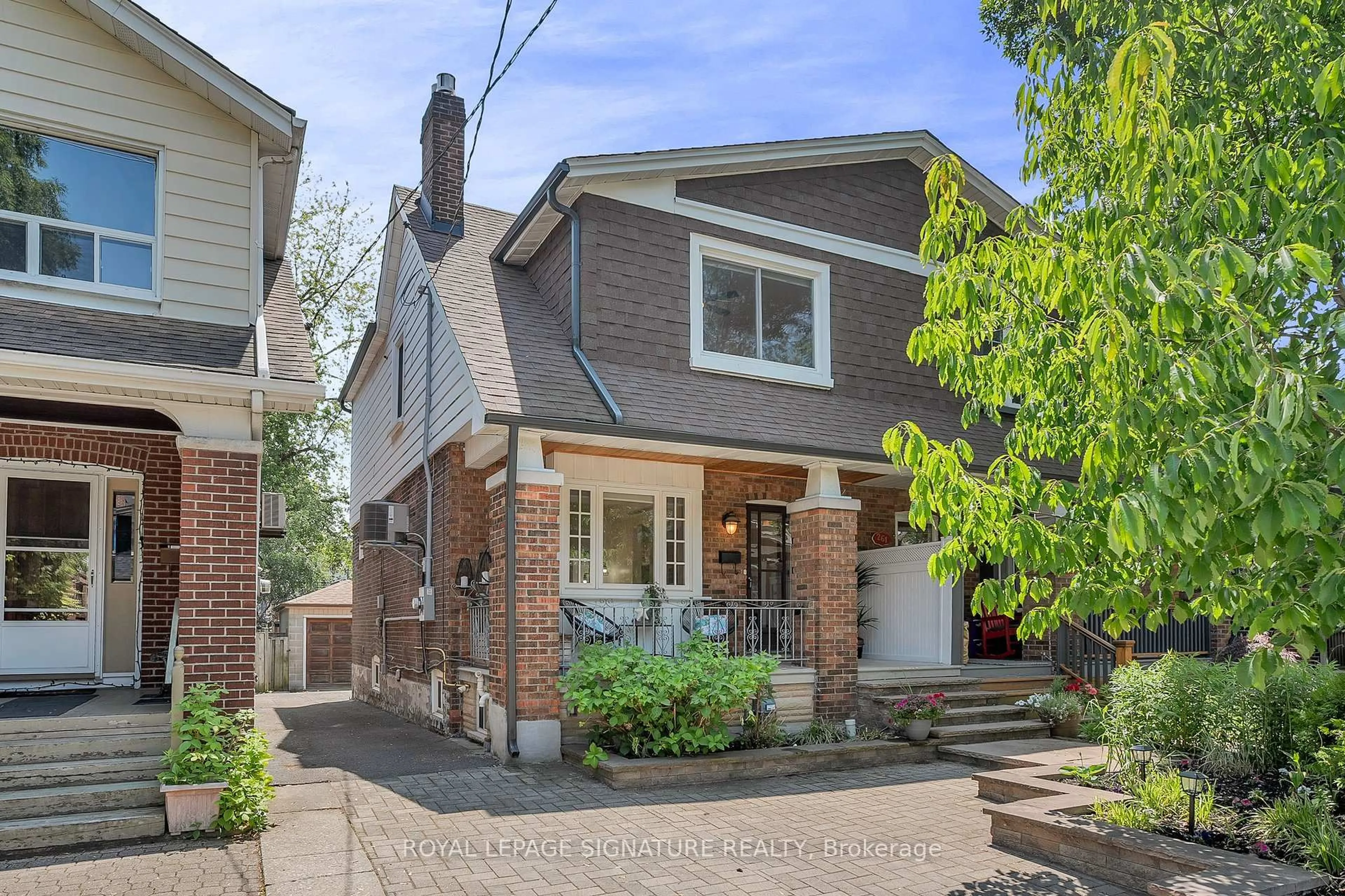 Home with brick exterior material, street for 263 Glebeholme Blvd, Toronto Ontario M4J 1T1