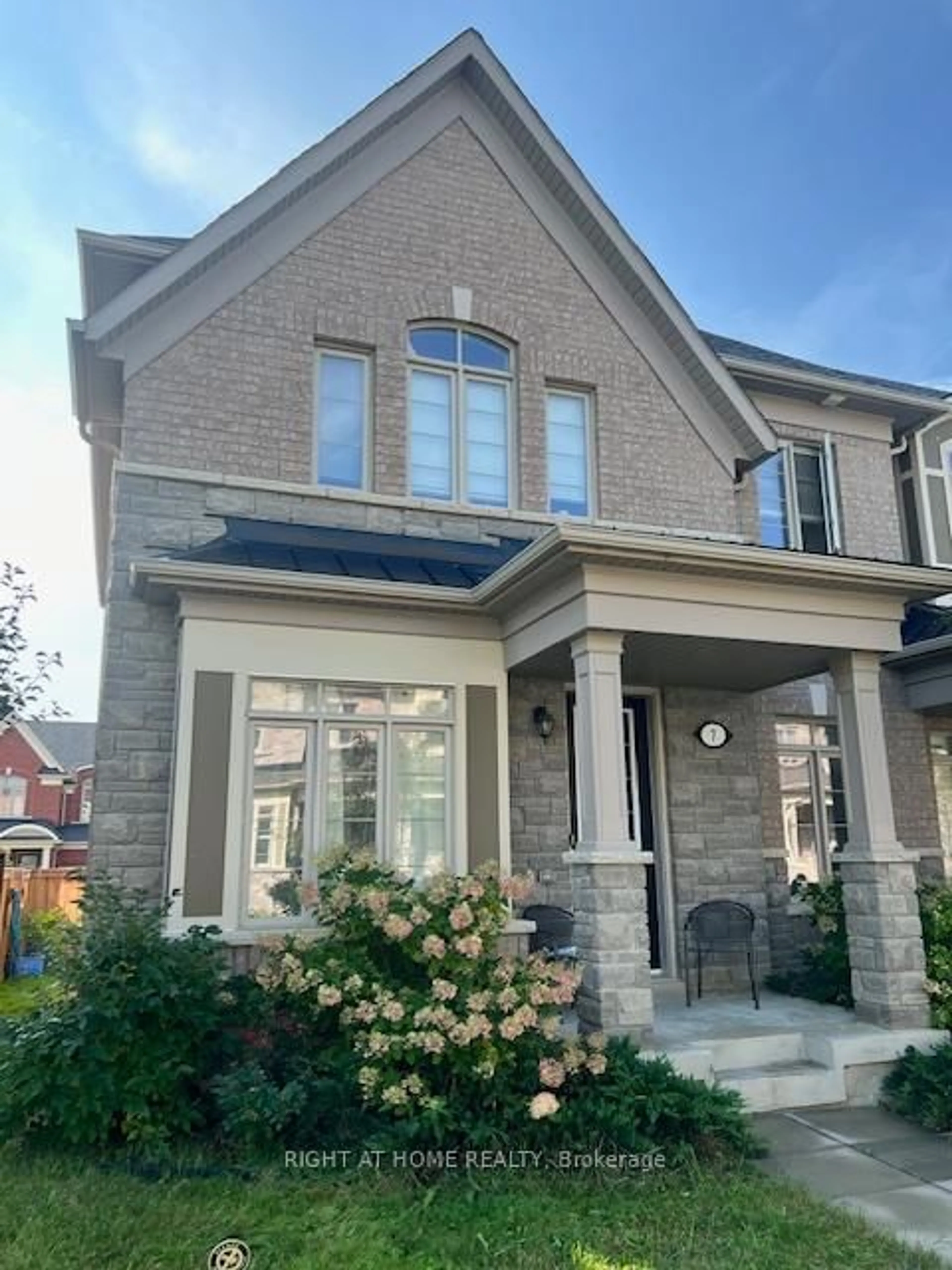 Home with brick exterior material, street for 7 Clutterbuck Lane, Ajax Ontario L1T 0N6