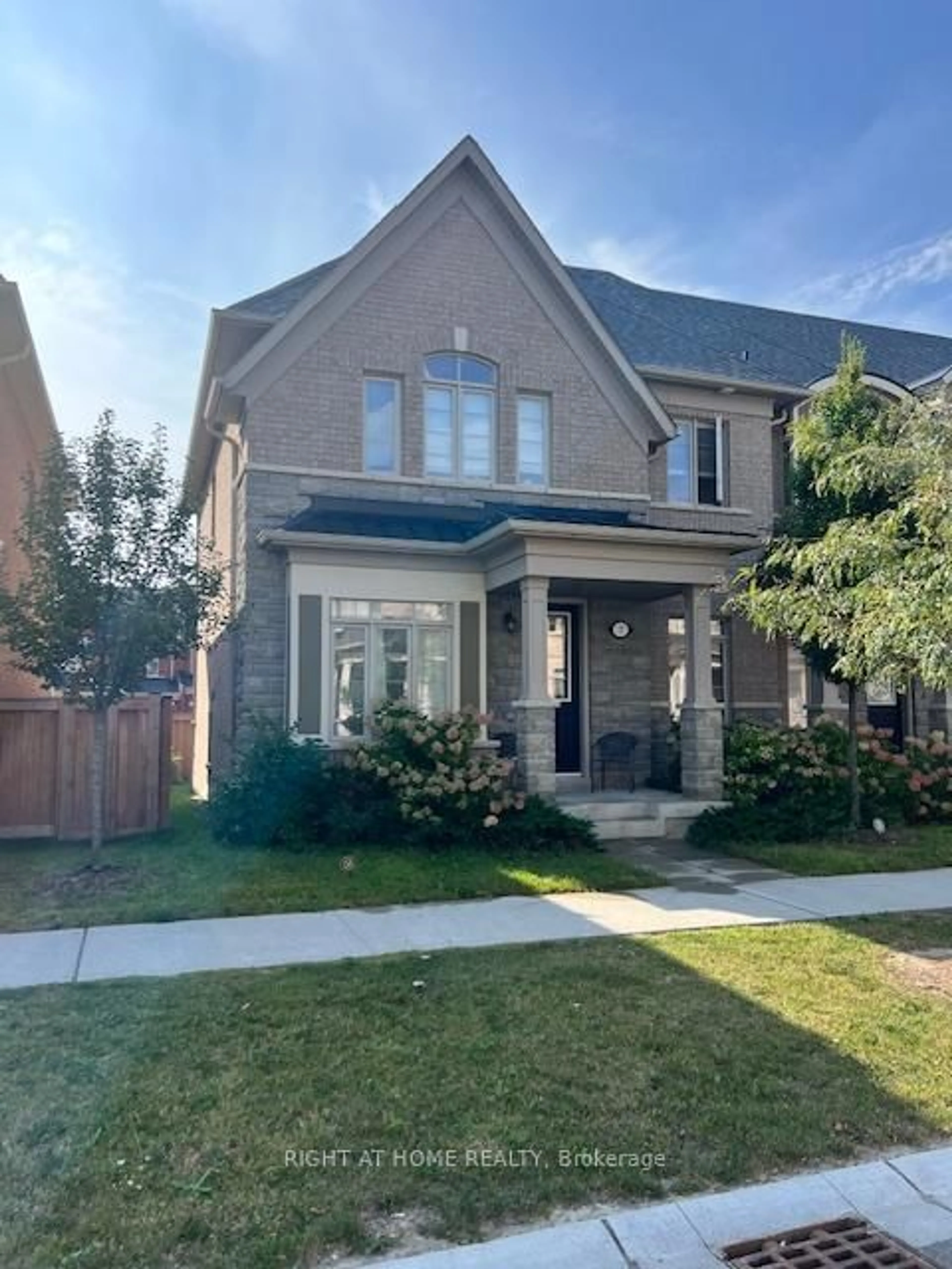 Home with brick exterior material, street for 7 Clutterbuck Lane, Ajax Ontario L1T 0N6