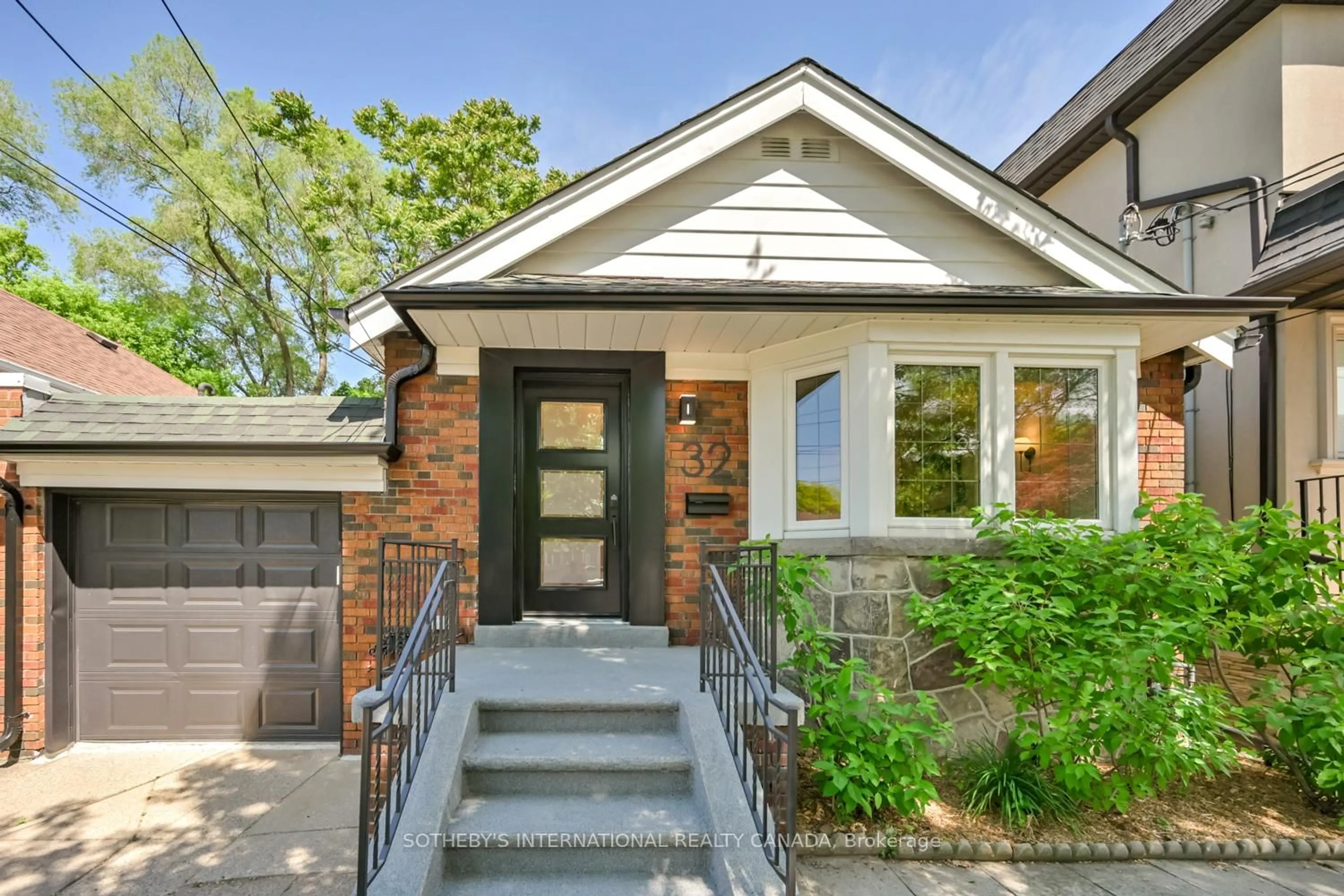 Home with brick exterior material, street for 32 Davies Cres, Toronto Ontario M4J 2X5