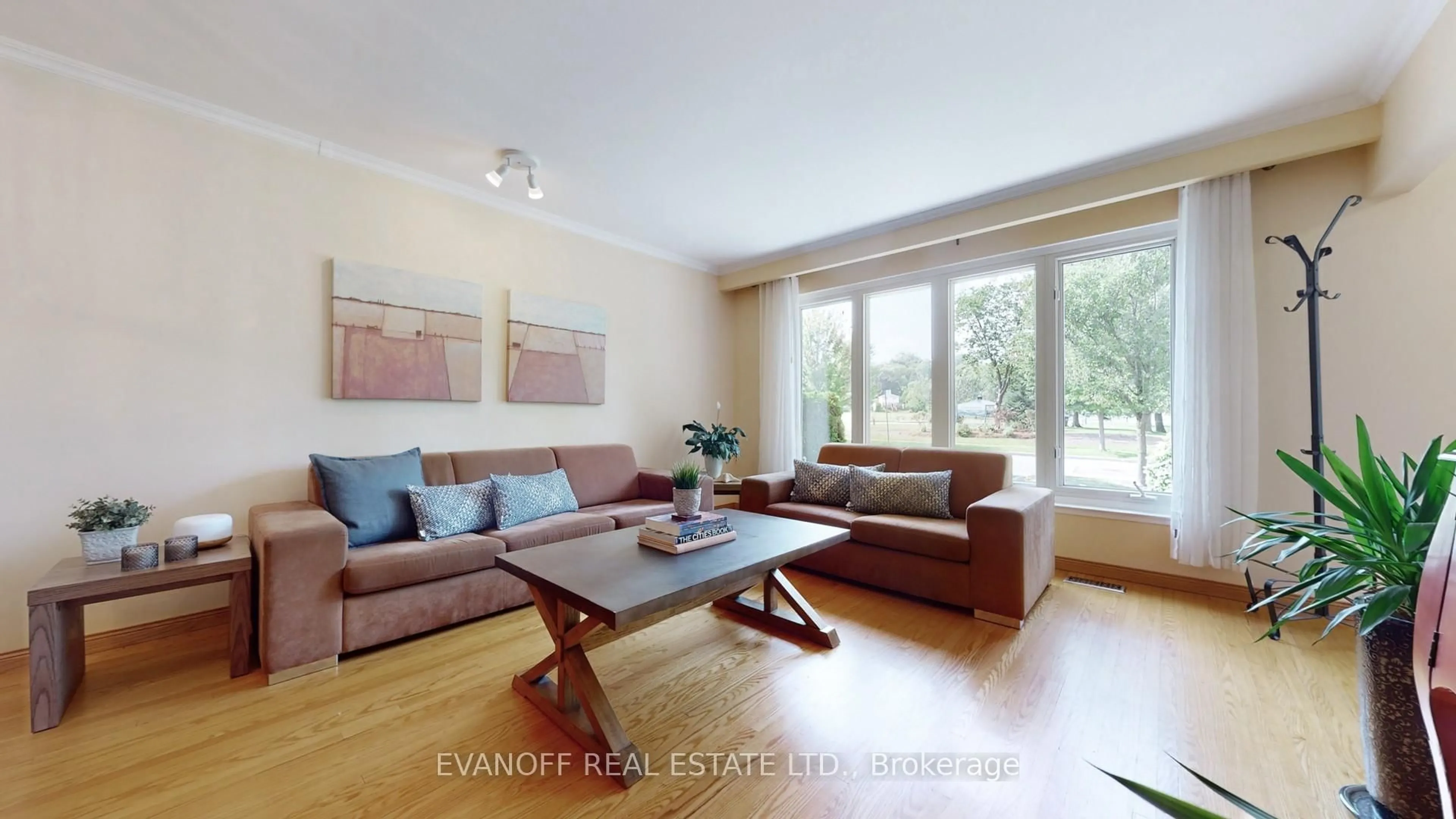 Living room with furniture, wood/laminate floor for 183 Sylvan Ave, Toronto Ontario M1E 1A4
