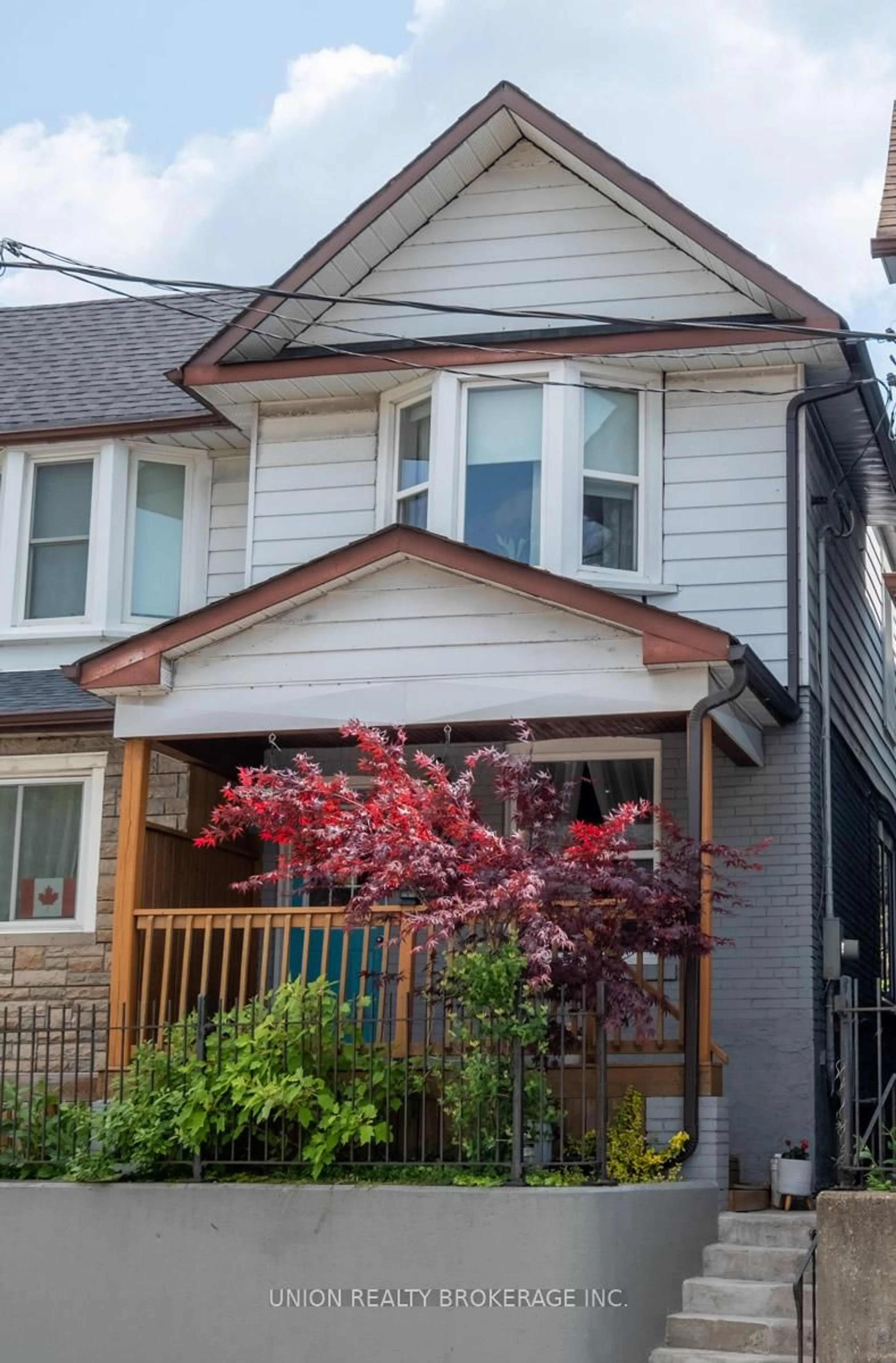 Home with vinyl exterior material, street for 793 Woodbine Ave, Toronto Ontario M4E 2J5