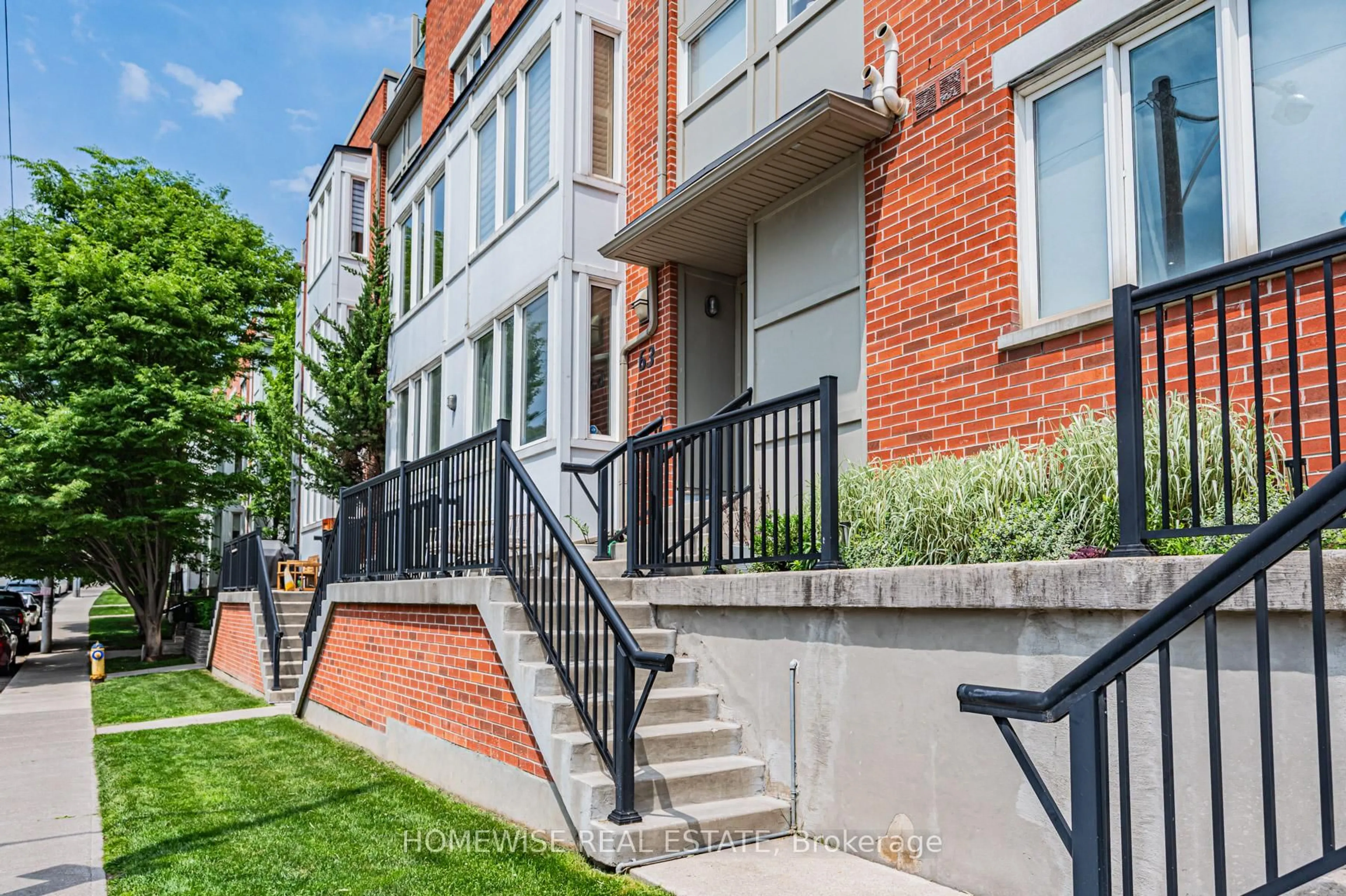 Home with brick exterior material, street for 63 Carroll St, Toronto Ontario M4M 3G2