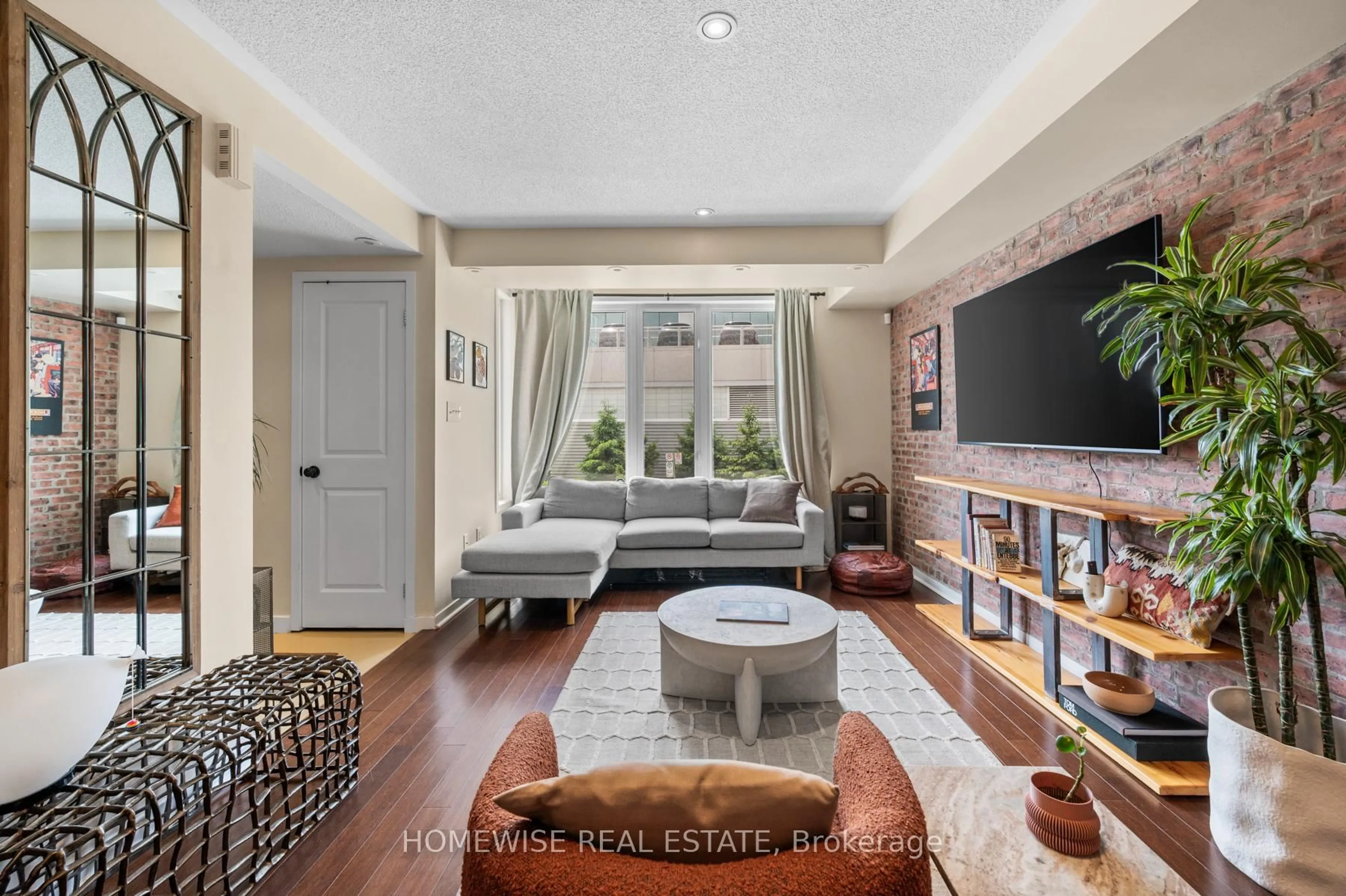 Living room with furniture, unknown for 63 Carroll St, Toronto Ontario M4M 3G2