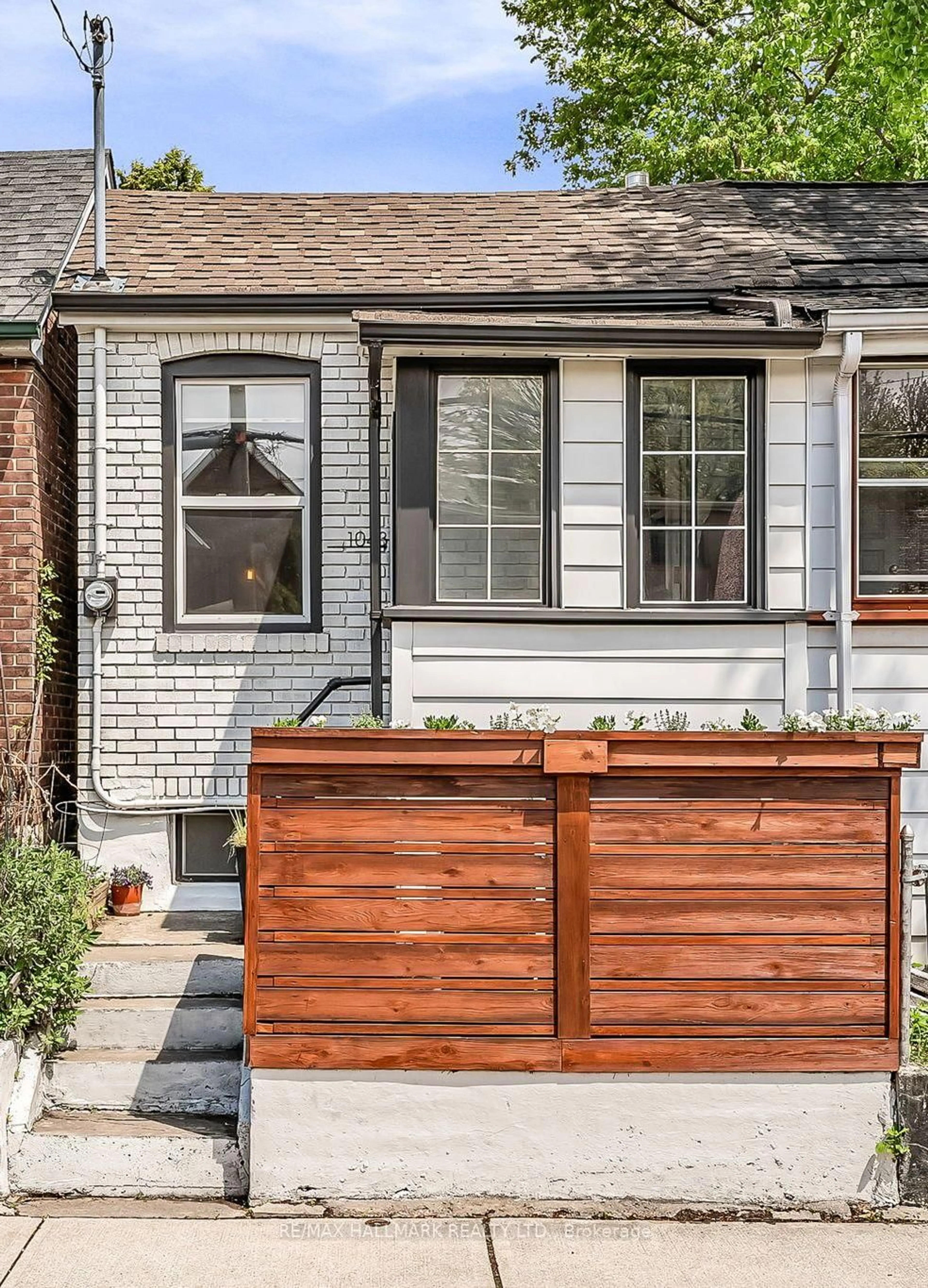 Home with brick exterior material, street for 1043 Craven Rd, Toronto Ontario M4J 4V7
