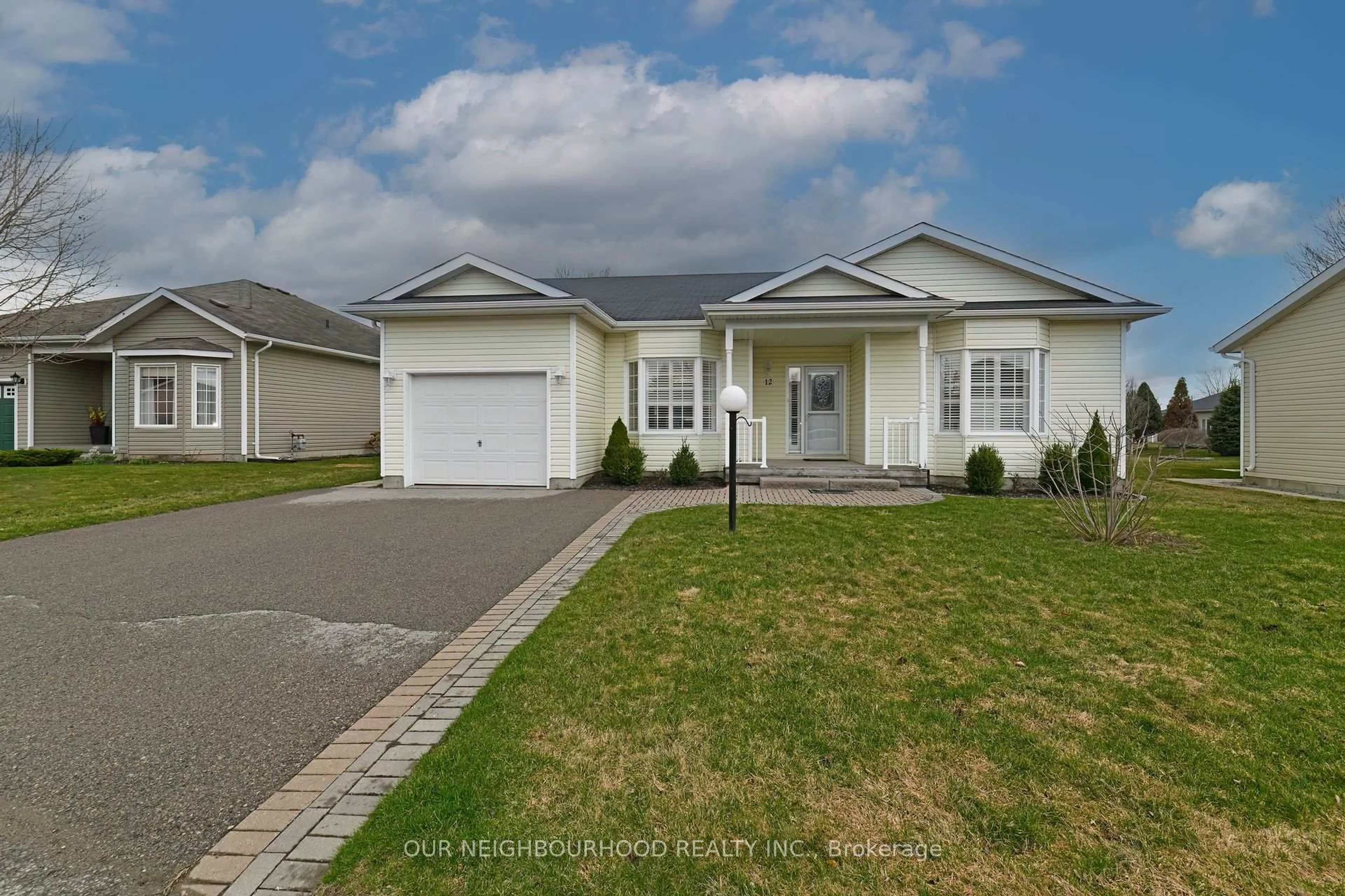 Home with vinyl exterior material, street for 12 Heatherlea Dr, Clarington Ontario L1B 1B9