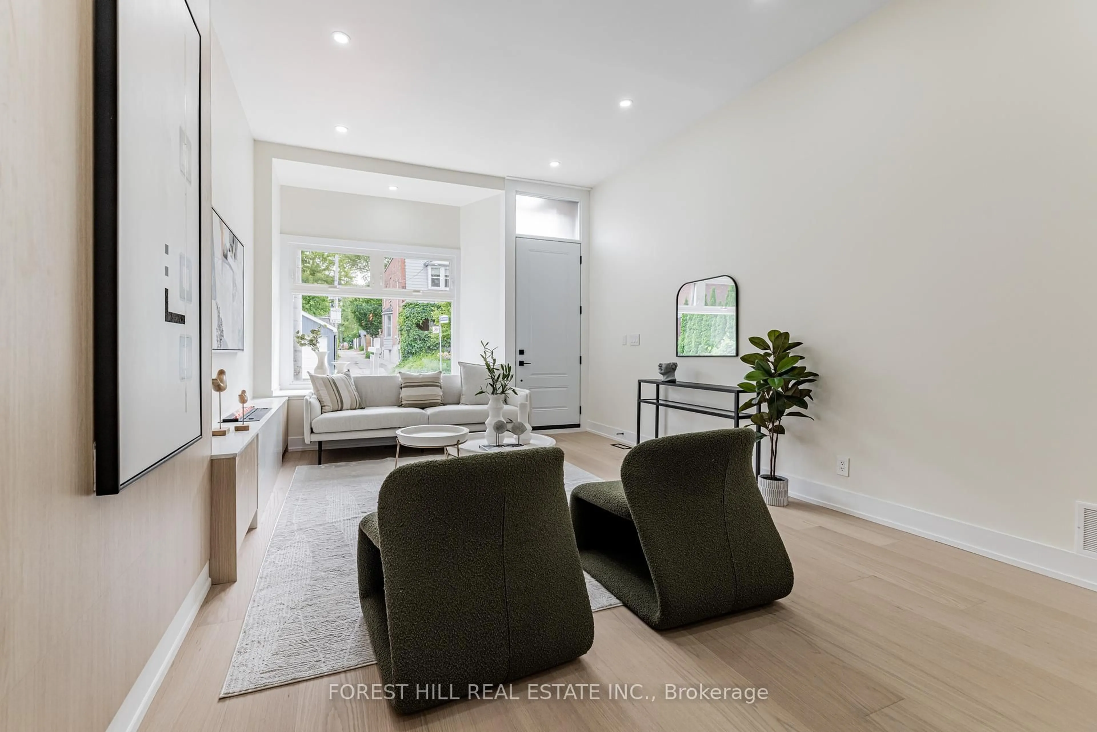 Living room with furniture, unknown for 557 Logan Ave, Toronto Ontario M4K 3B6