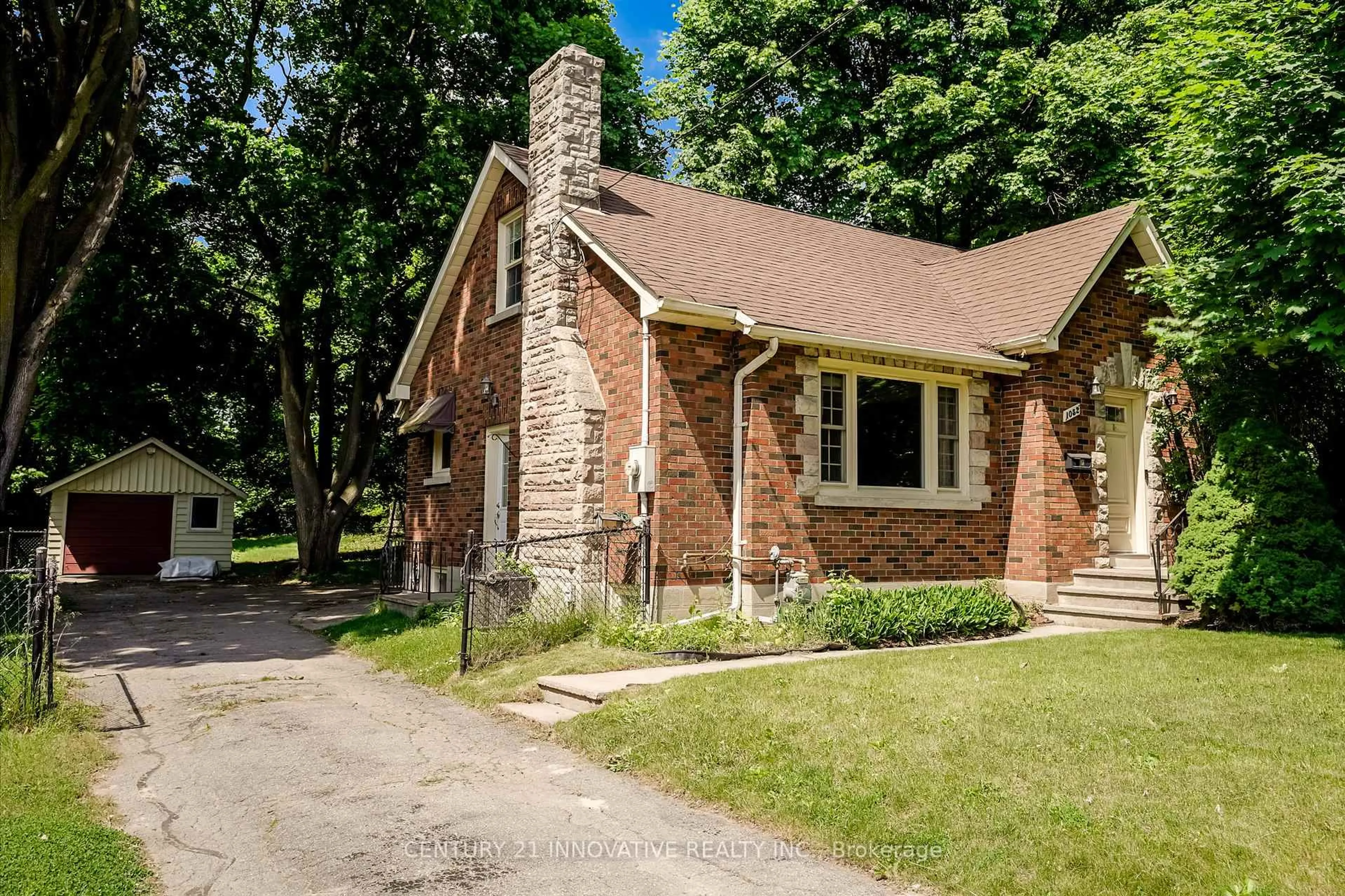 Home with brick exterior material, street for 1052 King St, Oshawa Ontario L1H 1H5