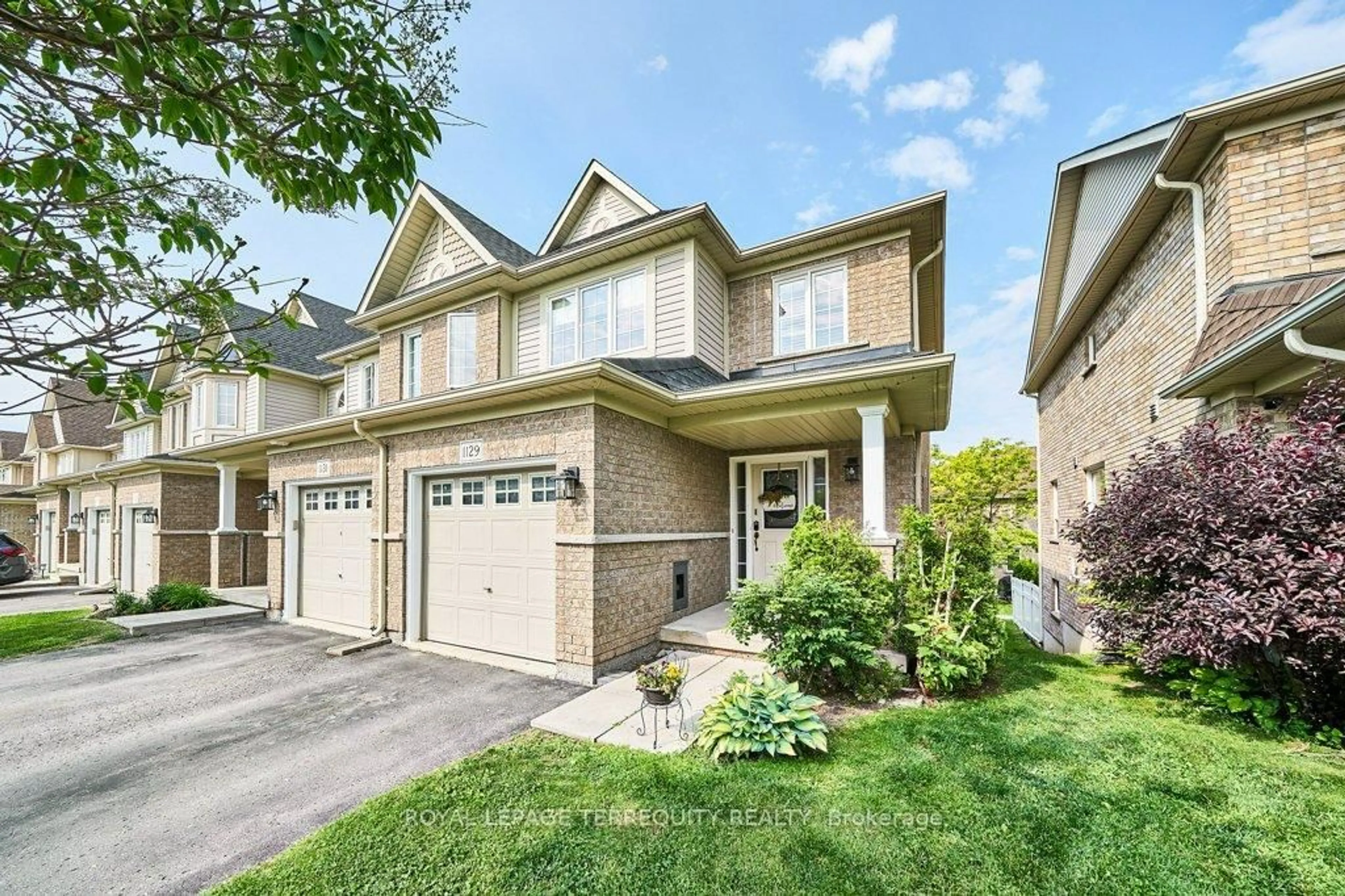 Home with brick exterior material, street for 1129 Ormond Dr #65, Oshawa Ontario L1K 0K5