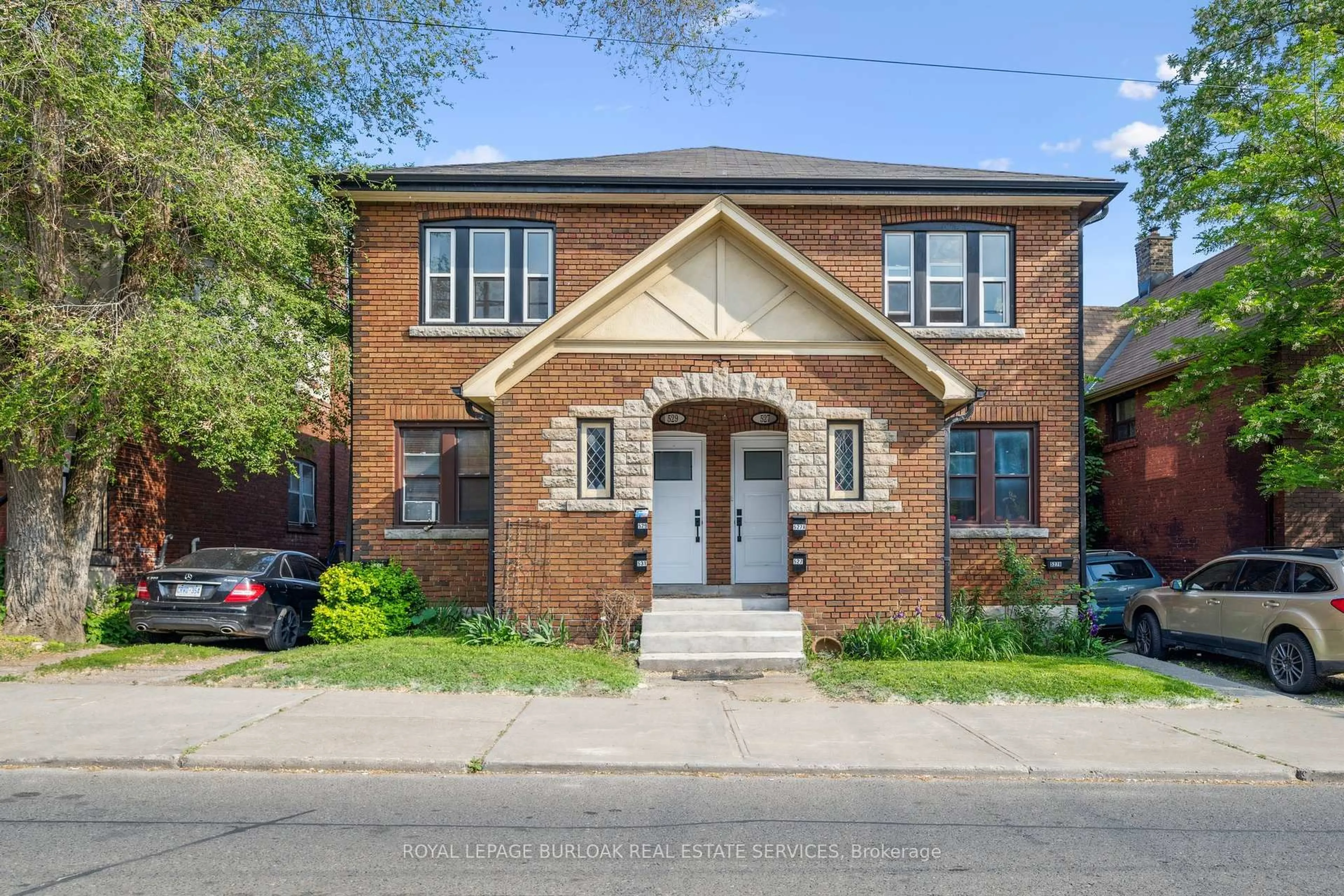Home with brick exterior material, street for 527 Kingston Rd, Toronto Ontario M4L 1V5