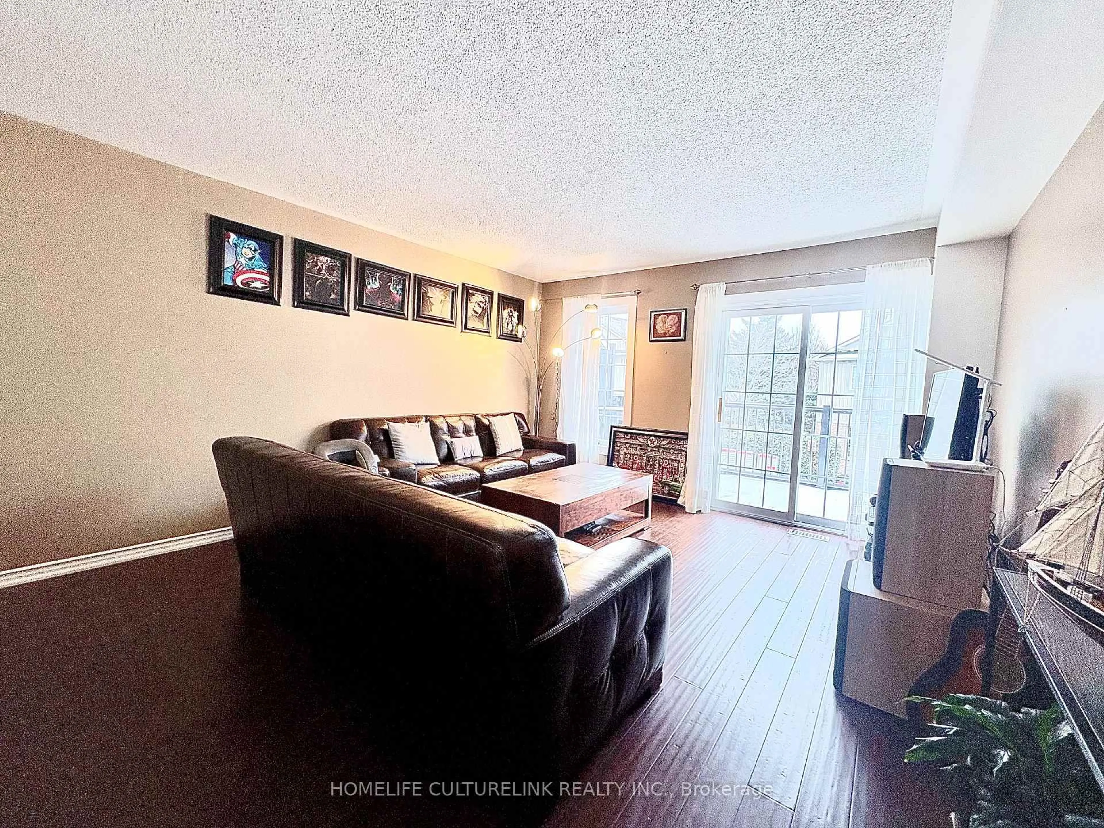 Living room with furniture, wood/laminate floor for 1100 Begley St #32, Pickering Ontario L1W 4B3