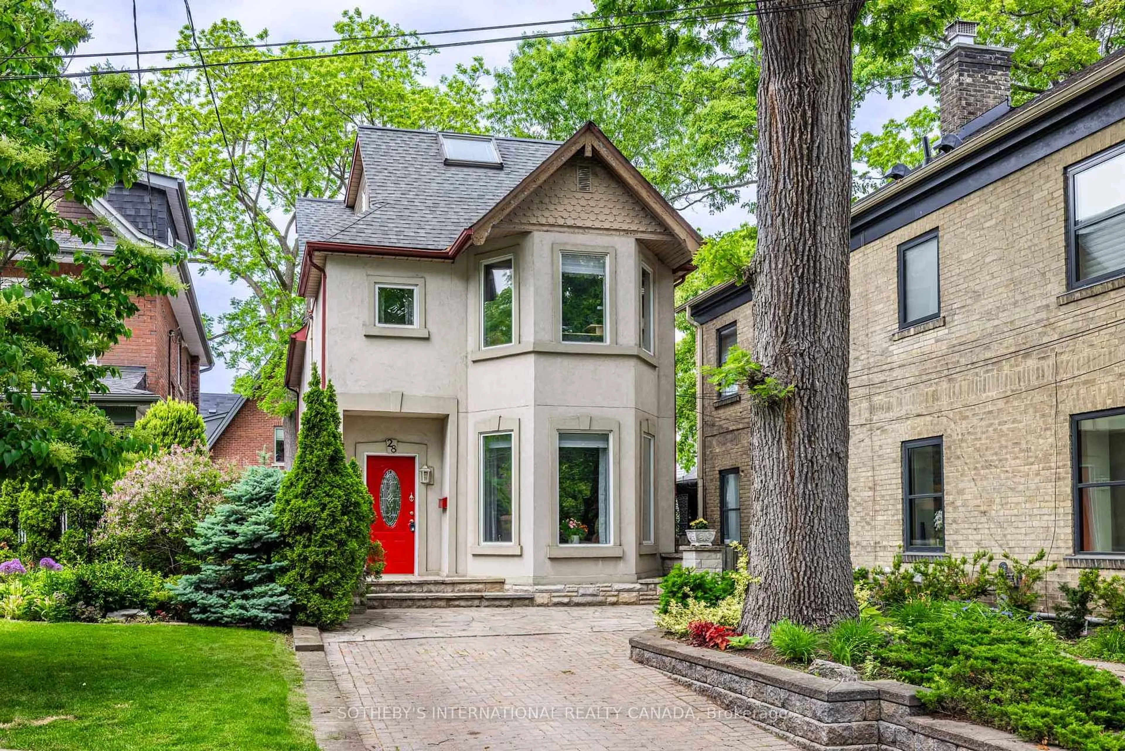 Home with brick exterior material, street for 28 Benlamond Ave, Toronto Ontario M4E 1Y9