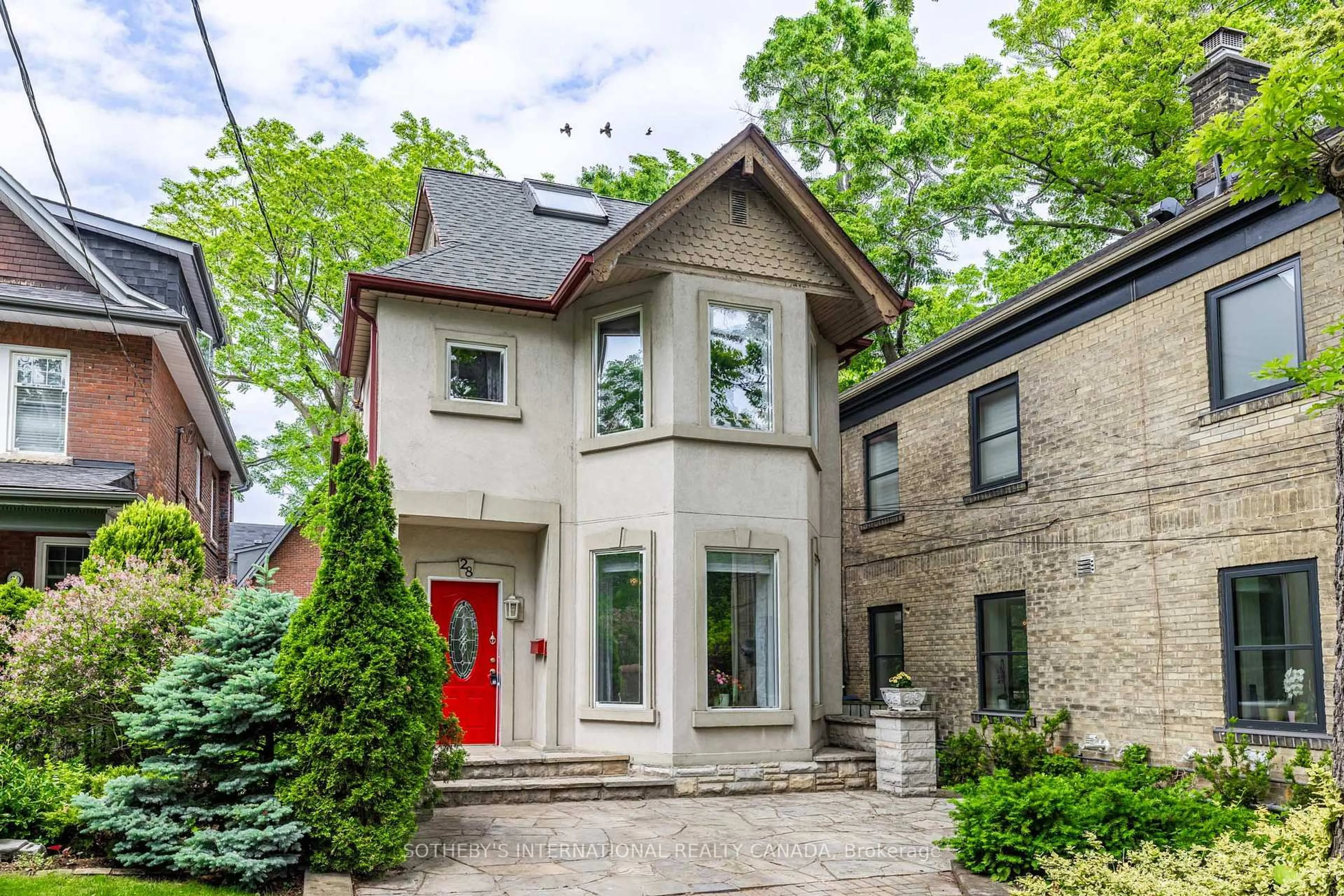 Home with brick exterior material, street for 28 Benlamond Ave, Toronto Ontario M4E 1Y9