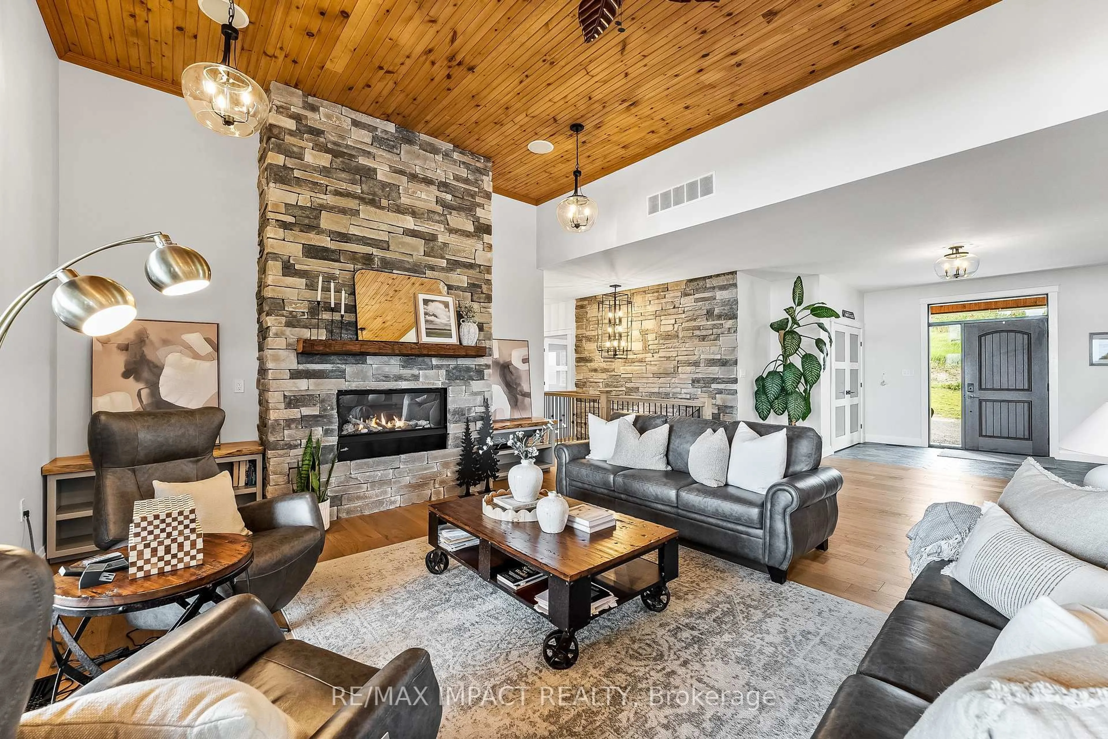Living room with furniture, wood/laminate floor for 2132 Newtonville Rd, Clarington Ontario L0A 1J0