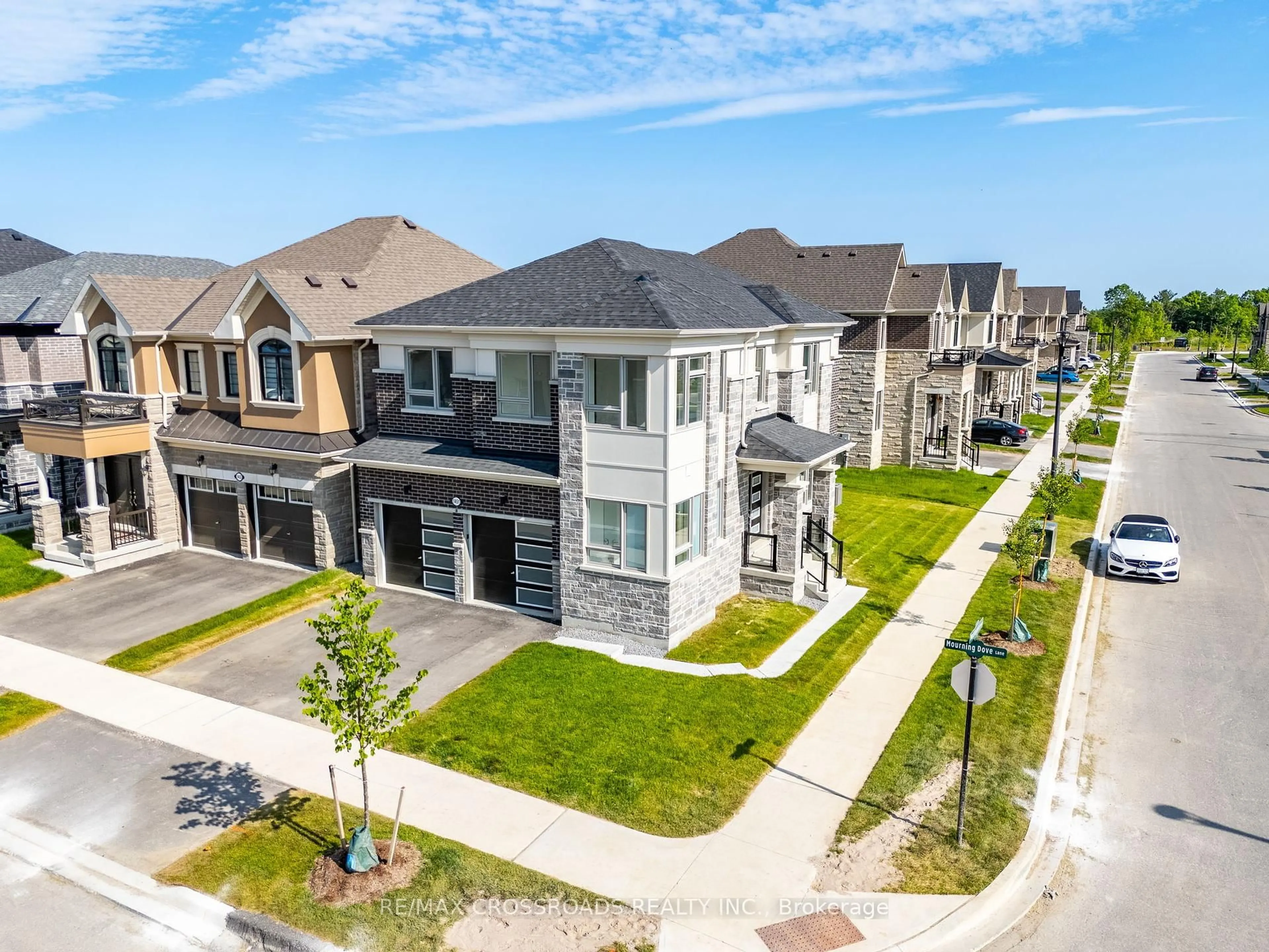 A pic from outside/outdoor area/front of a property/back of a property/a pic from drone, street for 1451 Mourning Dove Lane, Pickering Ontario L1X 0N8