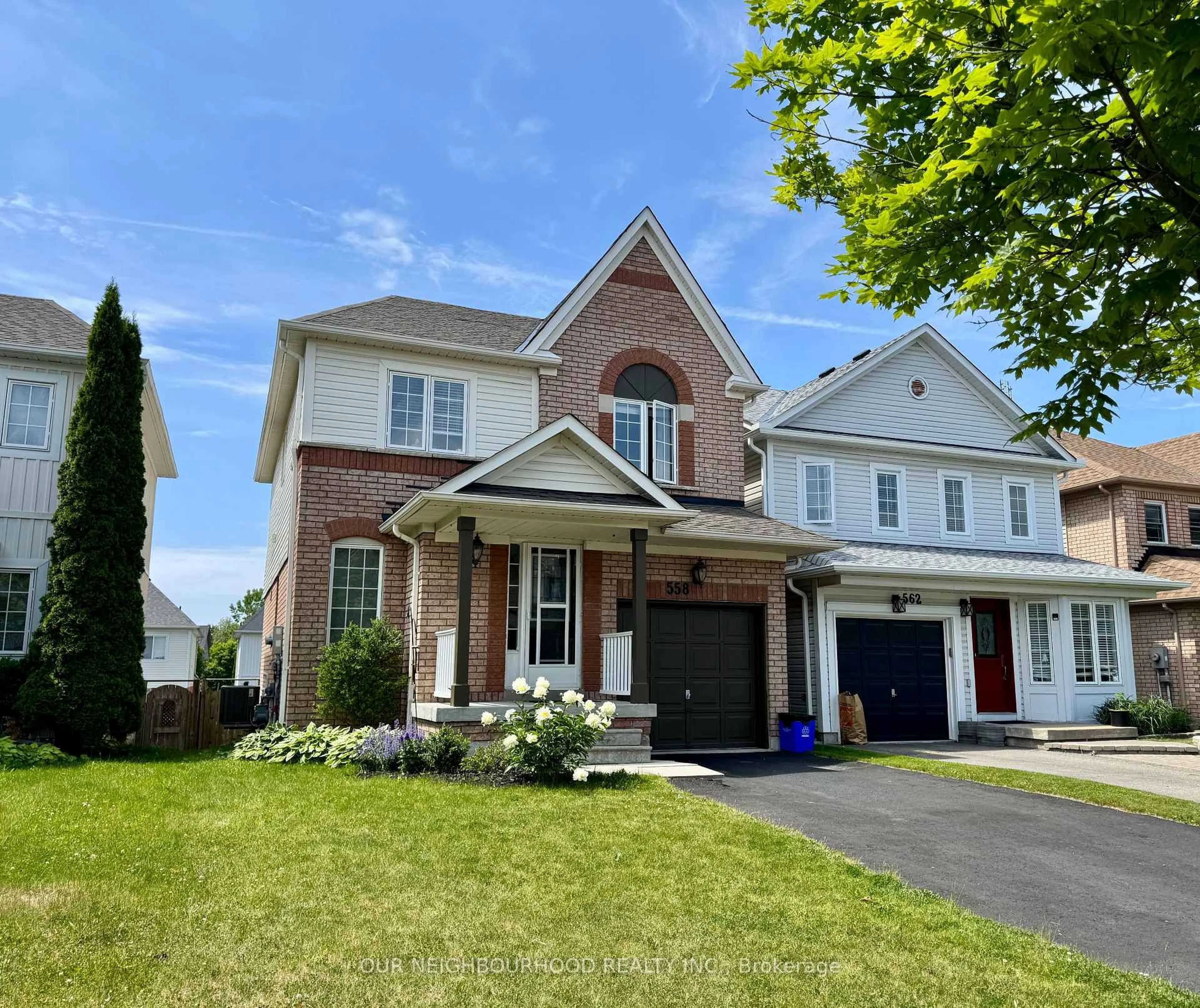 Home with brick exterior material, street for 558 Brasswinds Tr, Oshawa Ontario L1K 2Y9