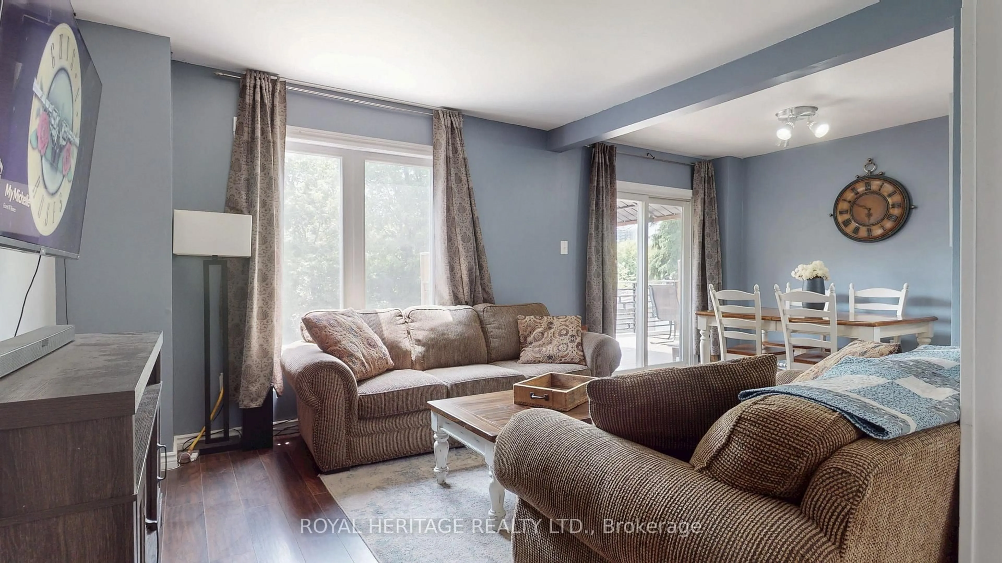 Living room with furniture, wood/laminate floor for 621 Cobblehill Dr, Oshawa Ontario L1K 1Y6