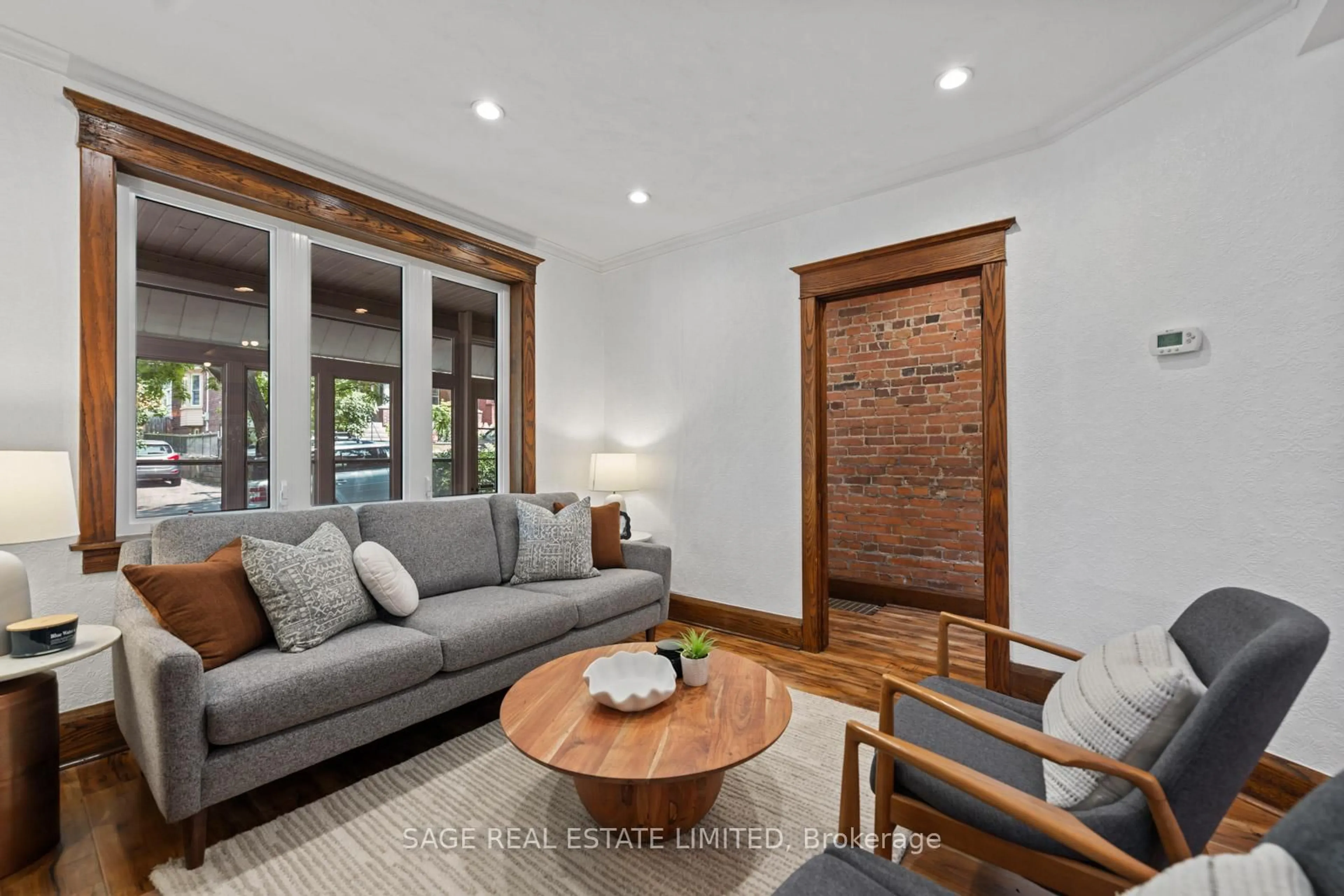 Living room with furniture, unknown for 106 Bellefair Ave, Toronto Ontario M4L 3T8