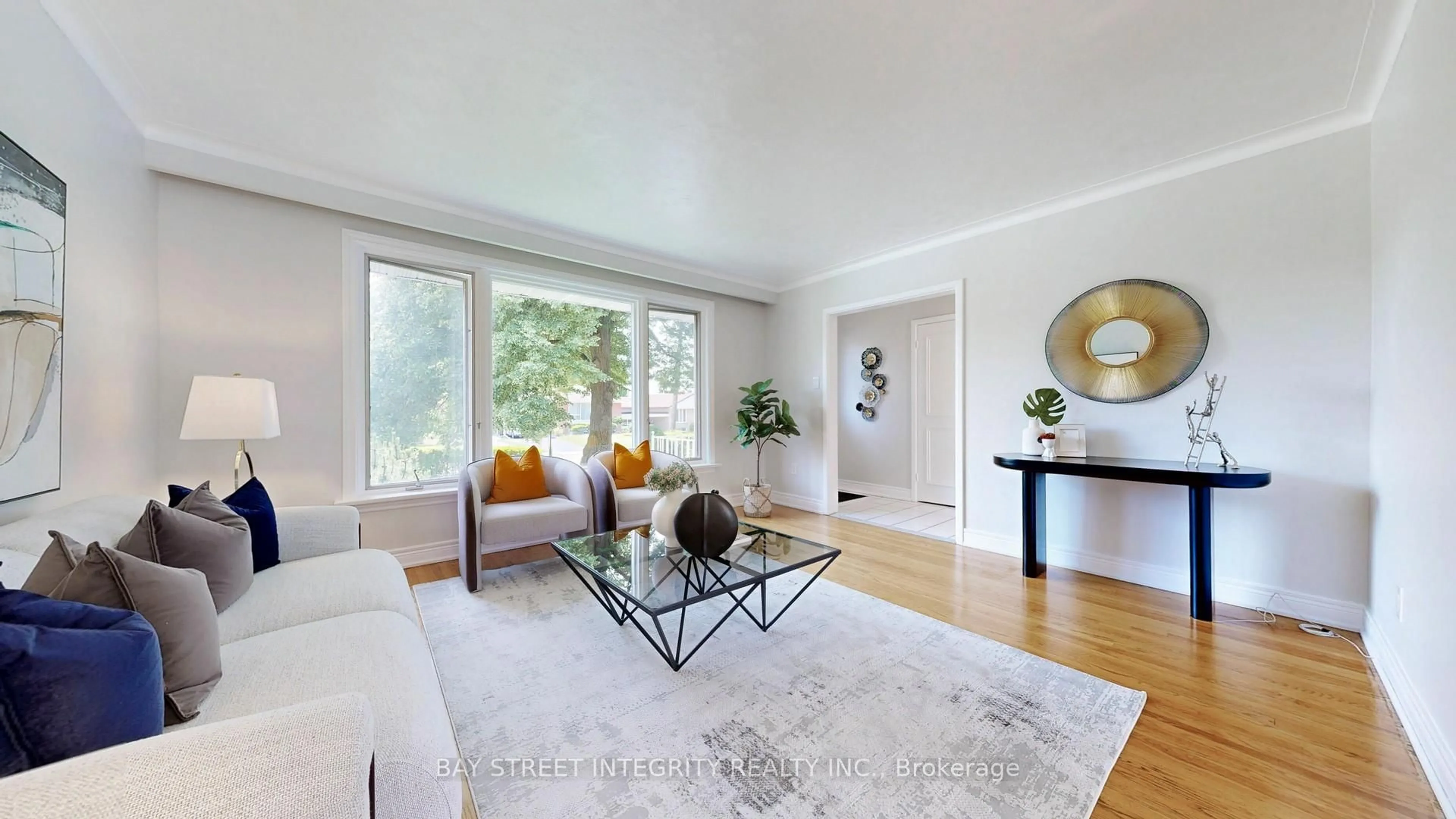 Living room with furniture, wood/laminate floor for 60 Beacham Cres, Toronto Ontario M1T 1N1