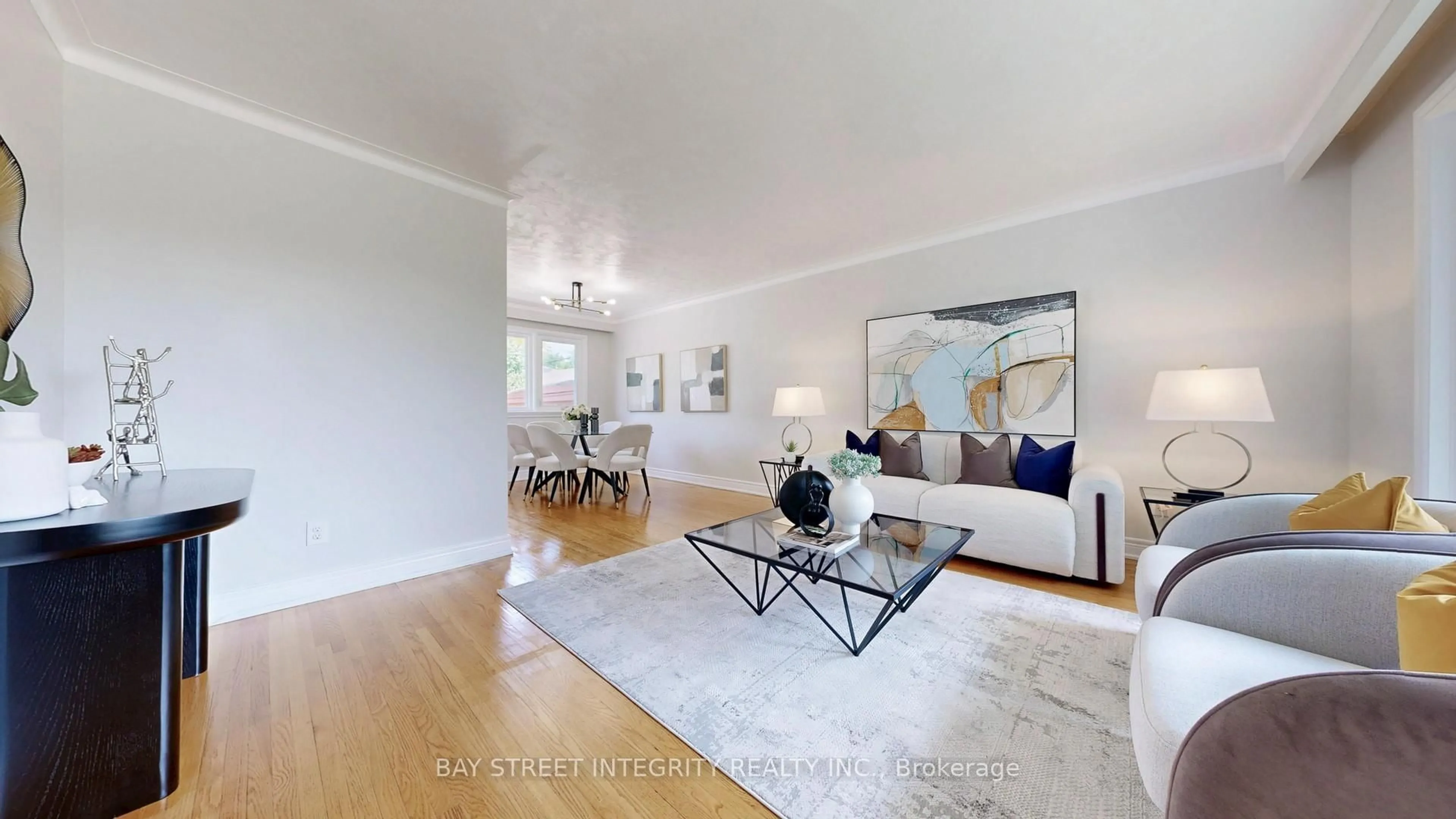 Living room with furniture, wood/laminate floor for 60 Beacham Cres, Toronto Ontario M1T 1N1