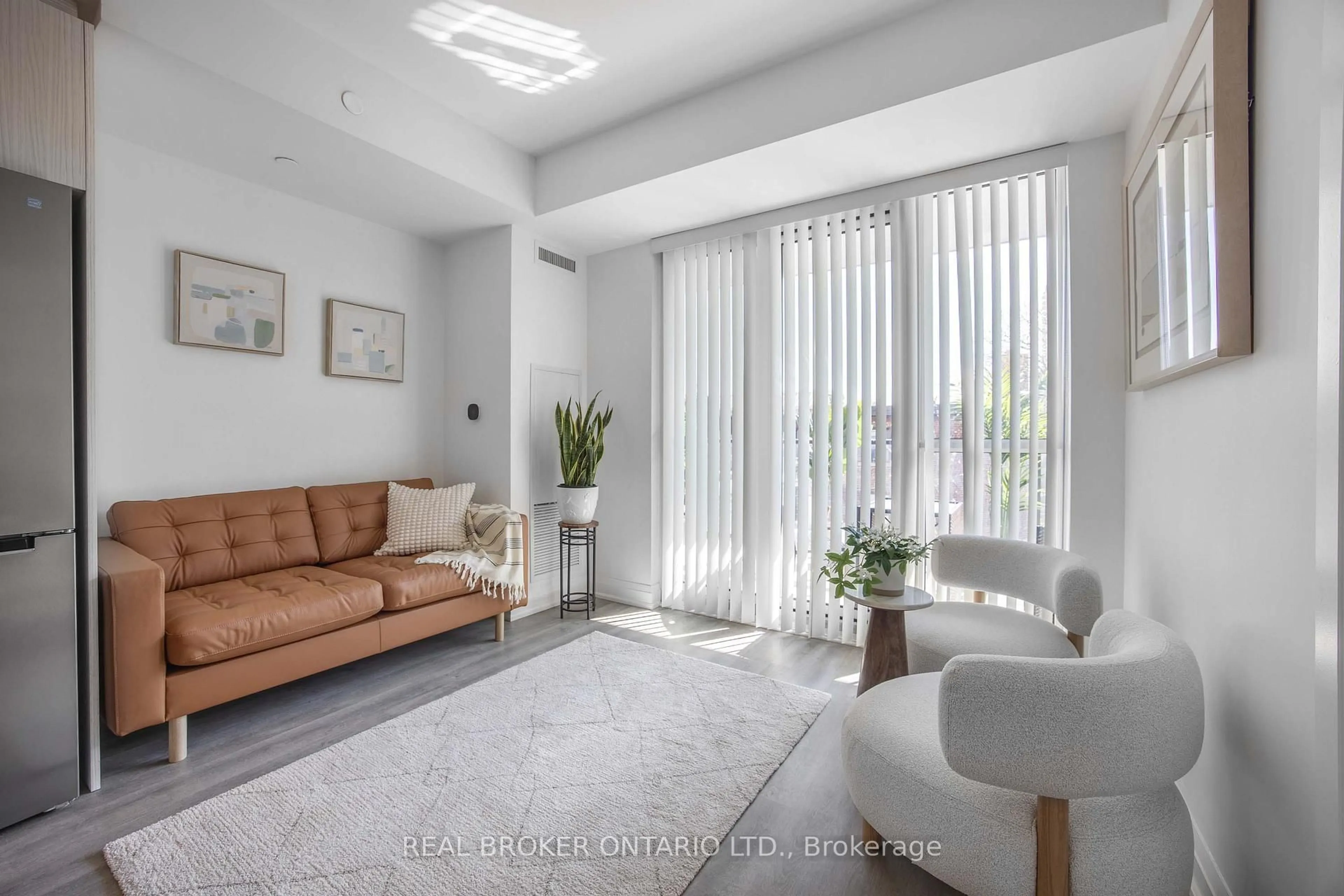Living room with furniture, unknown for 2369 Danforth Ave #210, Toronto Ontario M4C 0B1