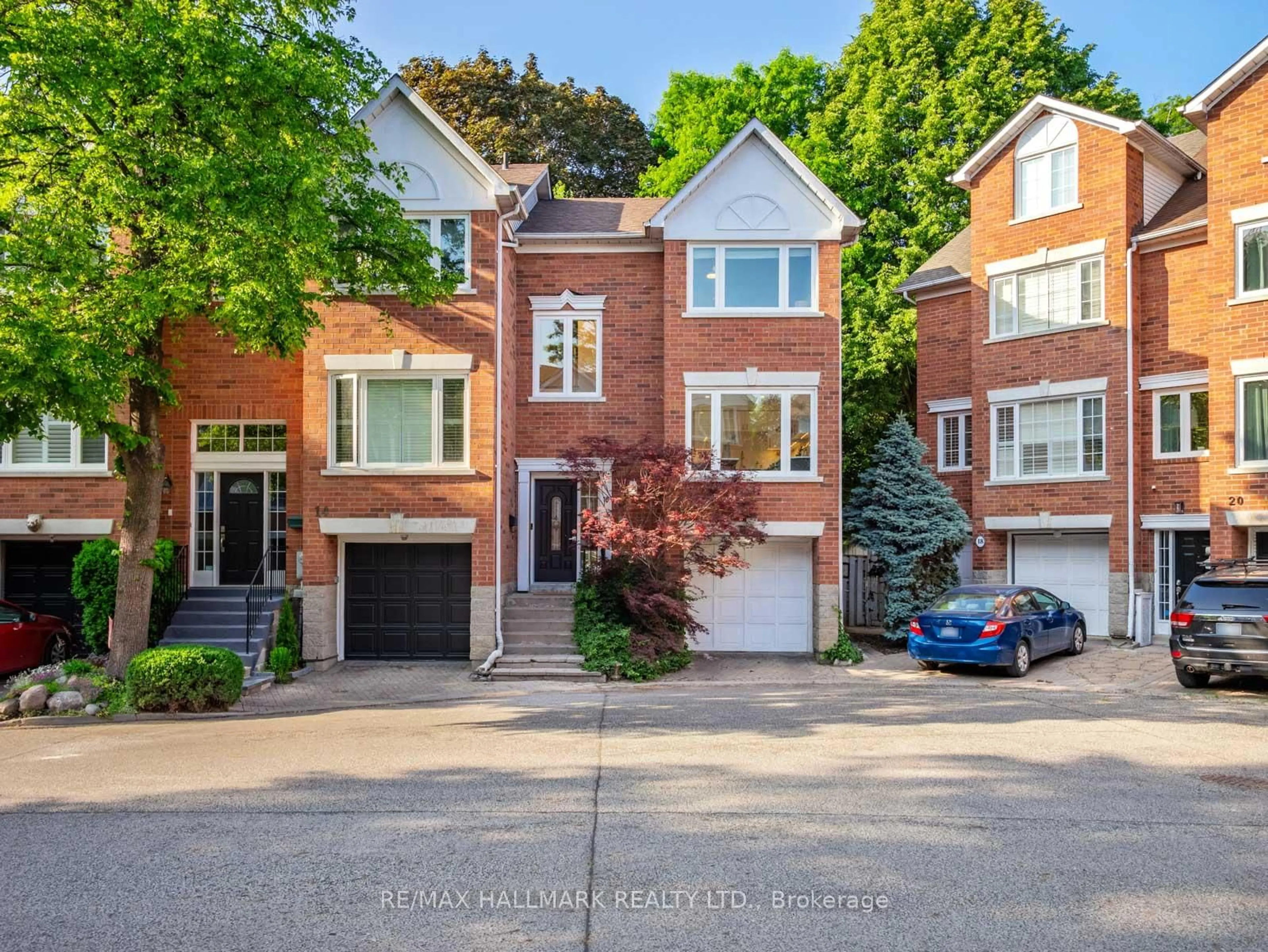 Home with brick exterior material, street for 16 Fitzgerald Mews, Toronto Ontario M4L 3X3