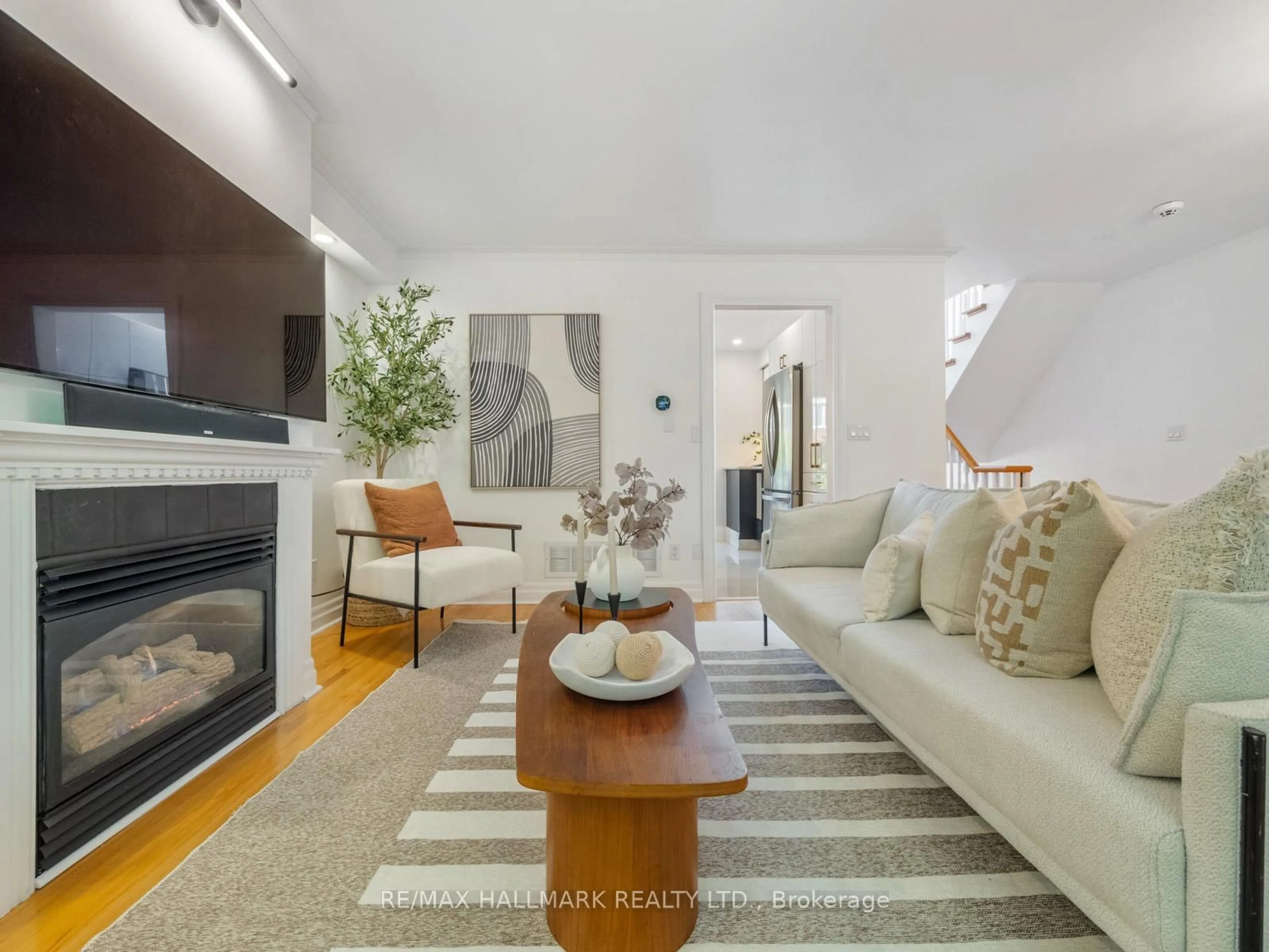 Living room with furniture, unknown for 16 Fitzgerald Mews, Toronto Ontario M4L 3X3
