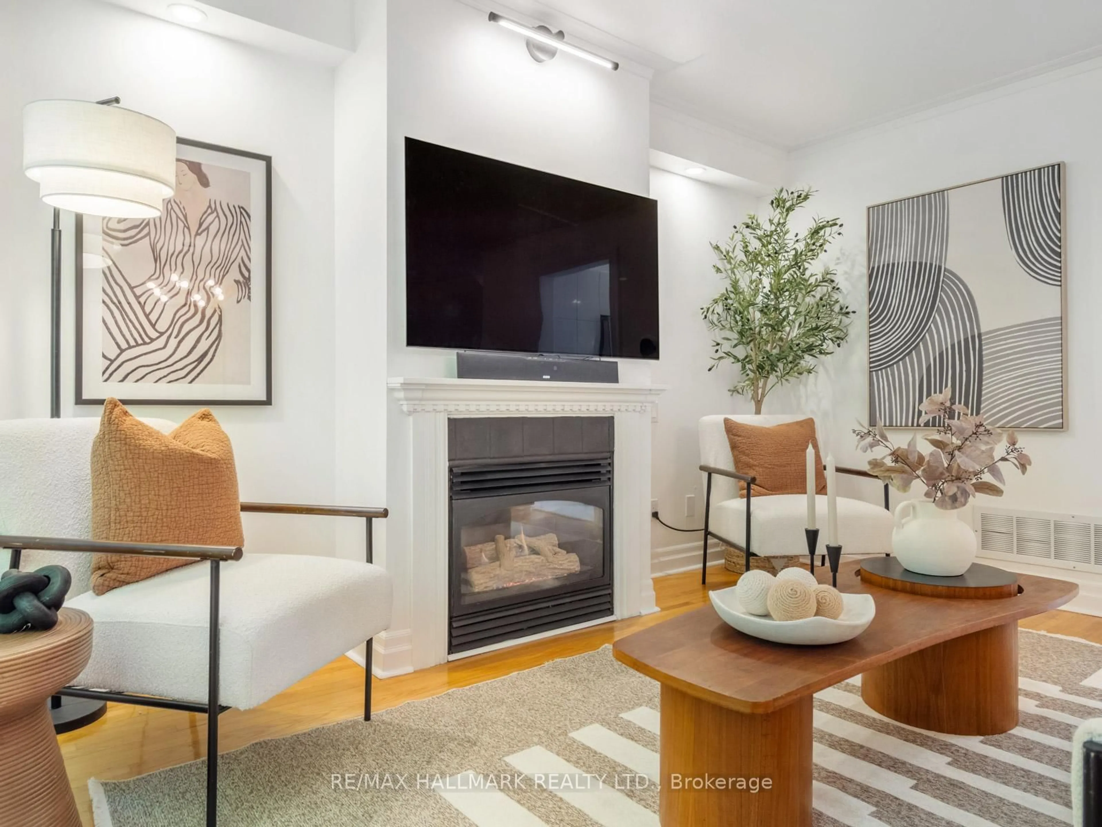 Living room with furniture, unknown for 16 Fitzgerald Mews, Toronto Ontario M4L 3X3