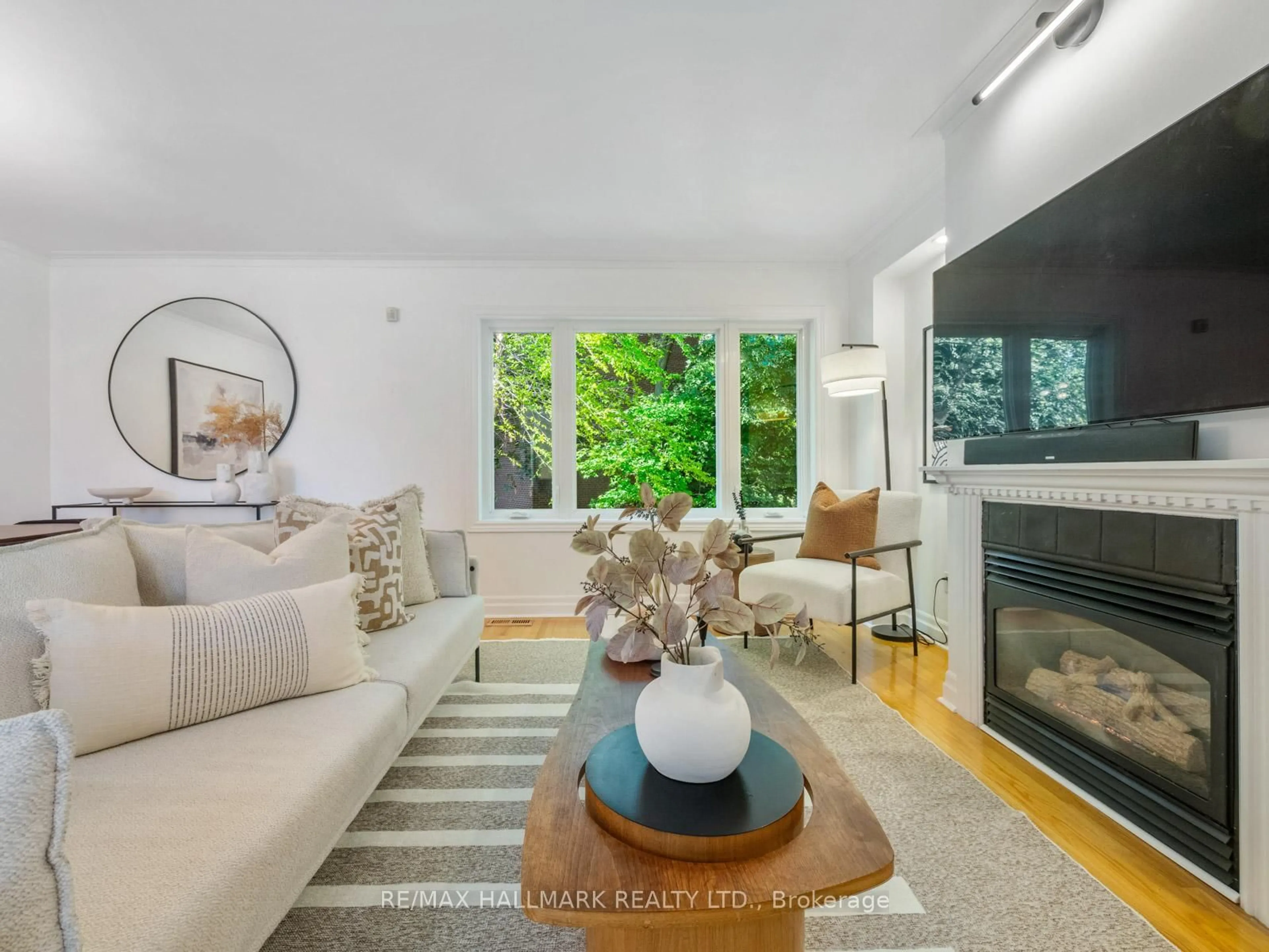 Living room with furniture, unknown for 16 Fitzgerald Mews, Toronto Ontario M4L 3X3