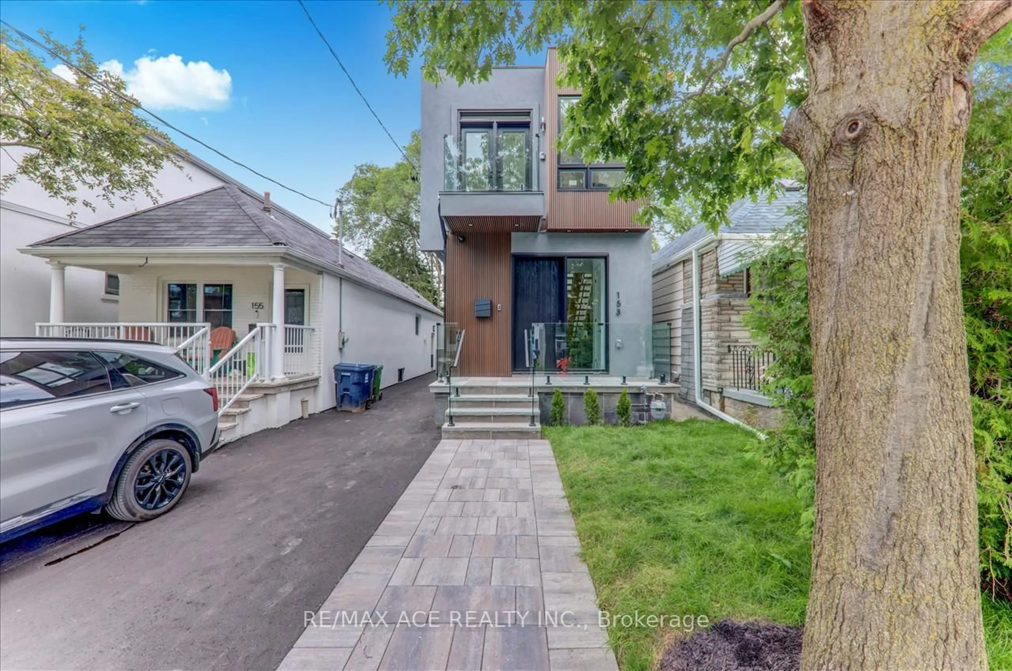 Home with brick exterior material, street for 153 King Edward Ave, Toronto Ontario M4C 5J7