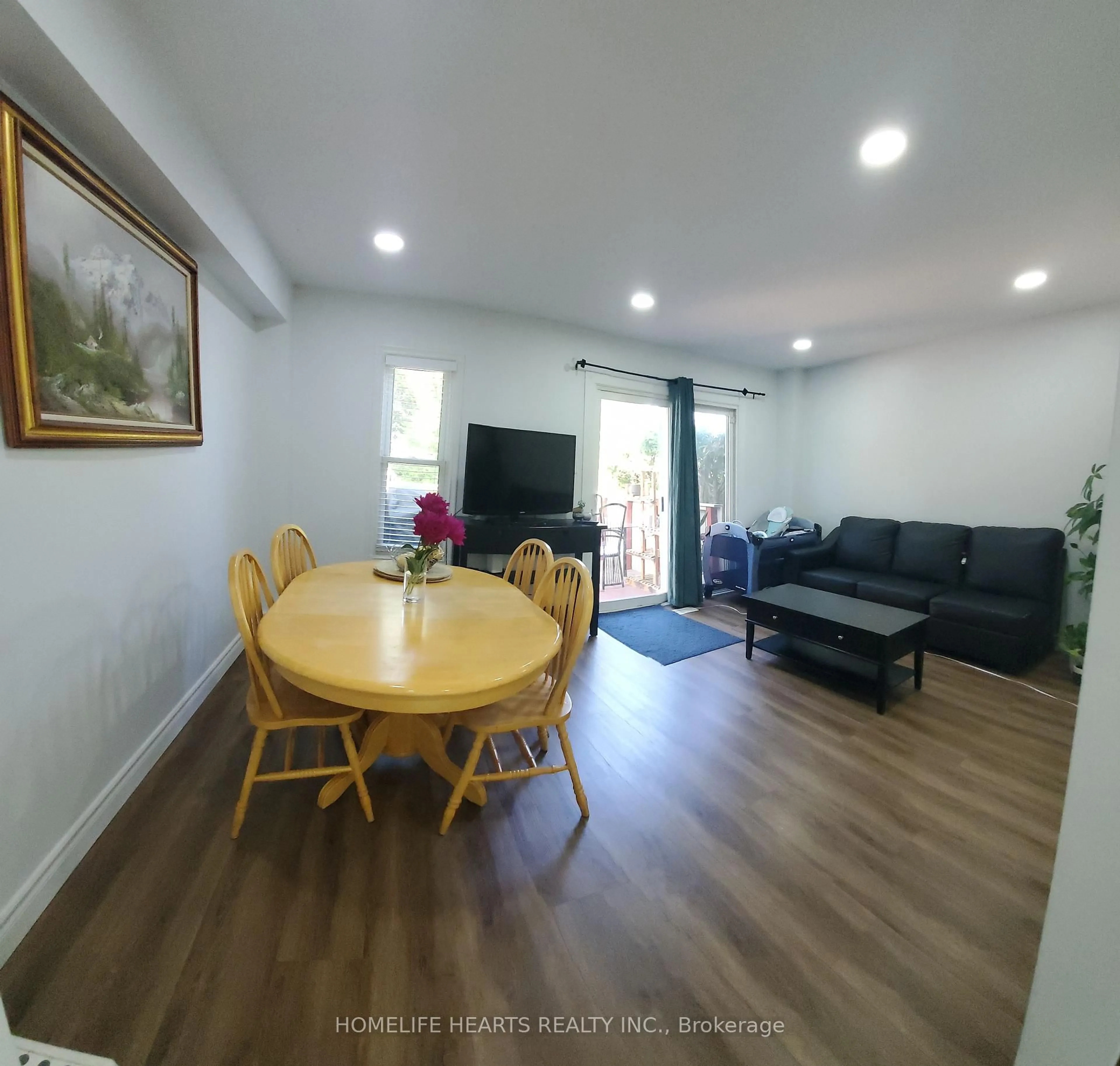 Living room with furniture, wood/laminate floor for 50 Silverbell Grve #21, Toronto Ontario M1B 2L7