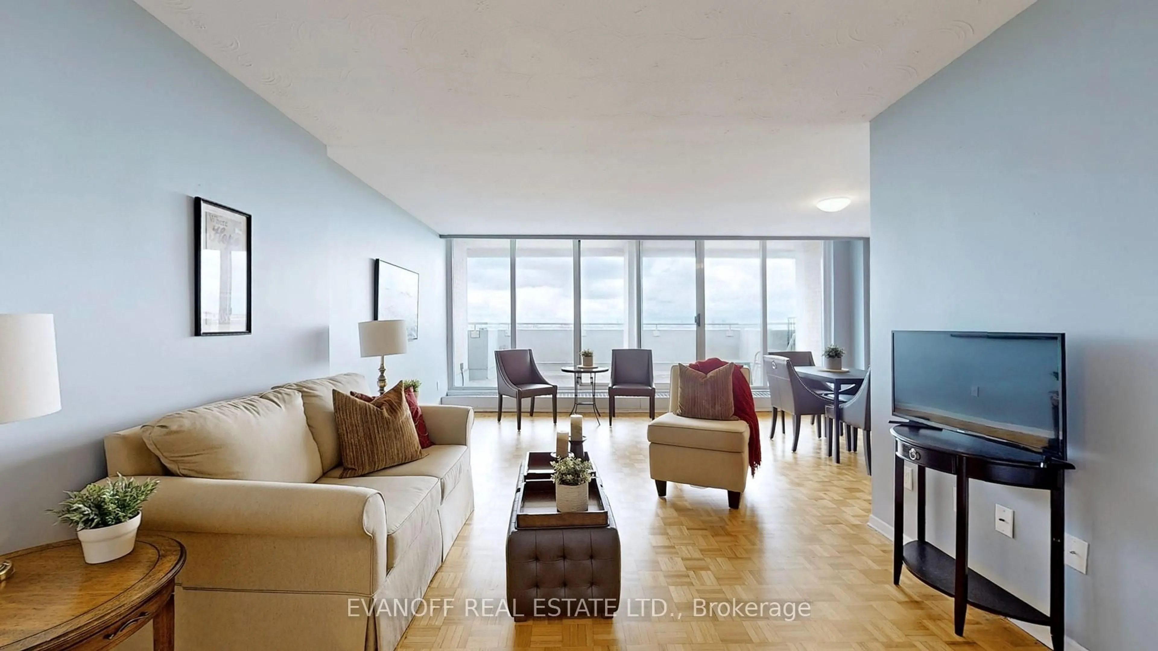 Living room with furniture, wood/laminate floor for 3311 Kingston Rd #PH 4, Toronto Ontario M1M 1R1