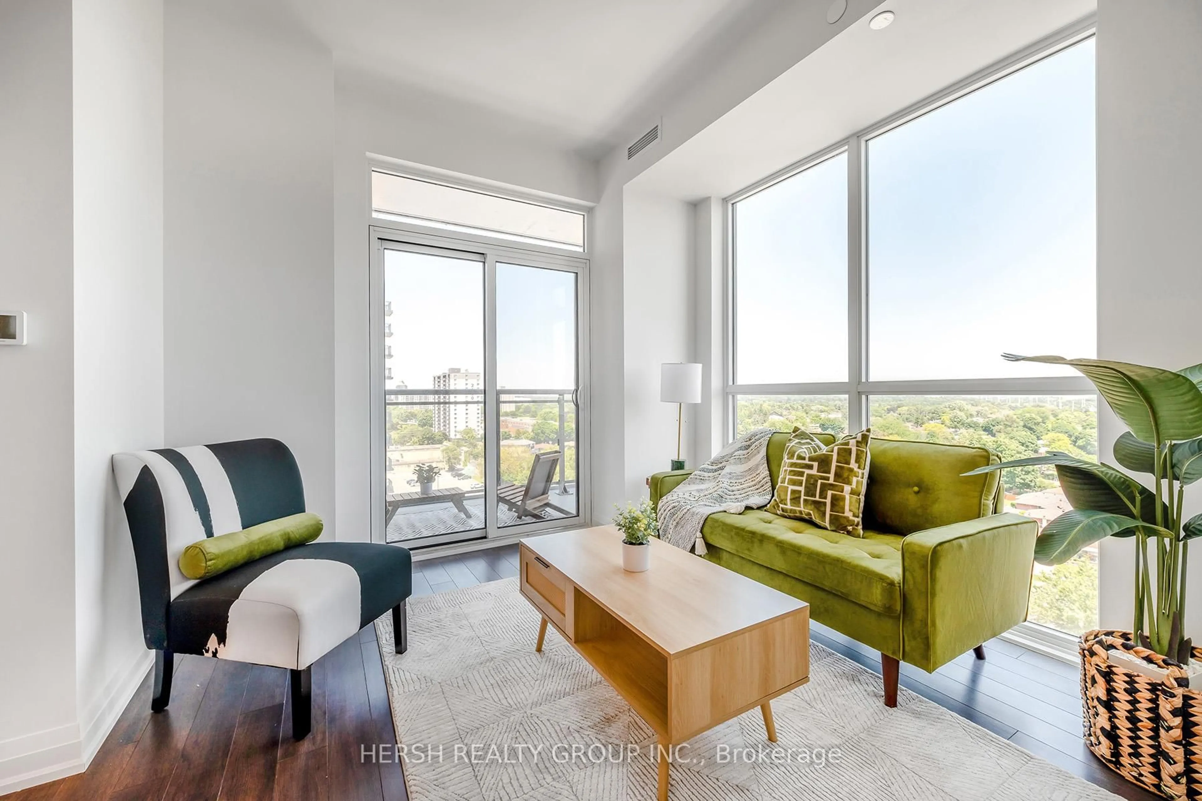 Living room with furniture, unknown for 10 Meadowglen Pl #206, Toronto Ontario M1G 0A8