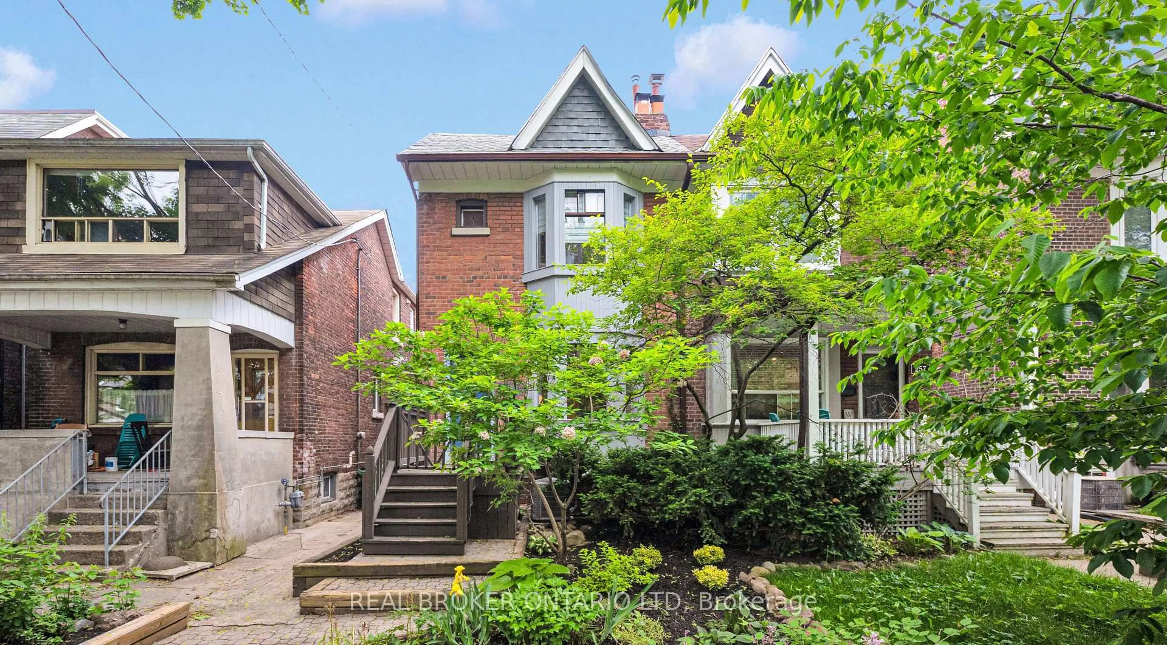 Home with brick exterior material, street for 259 Strathmore Blvd, Toronto Ontario M4J 1P7