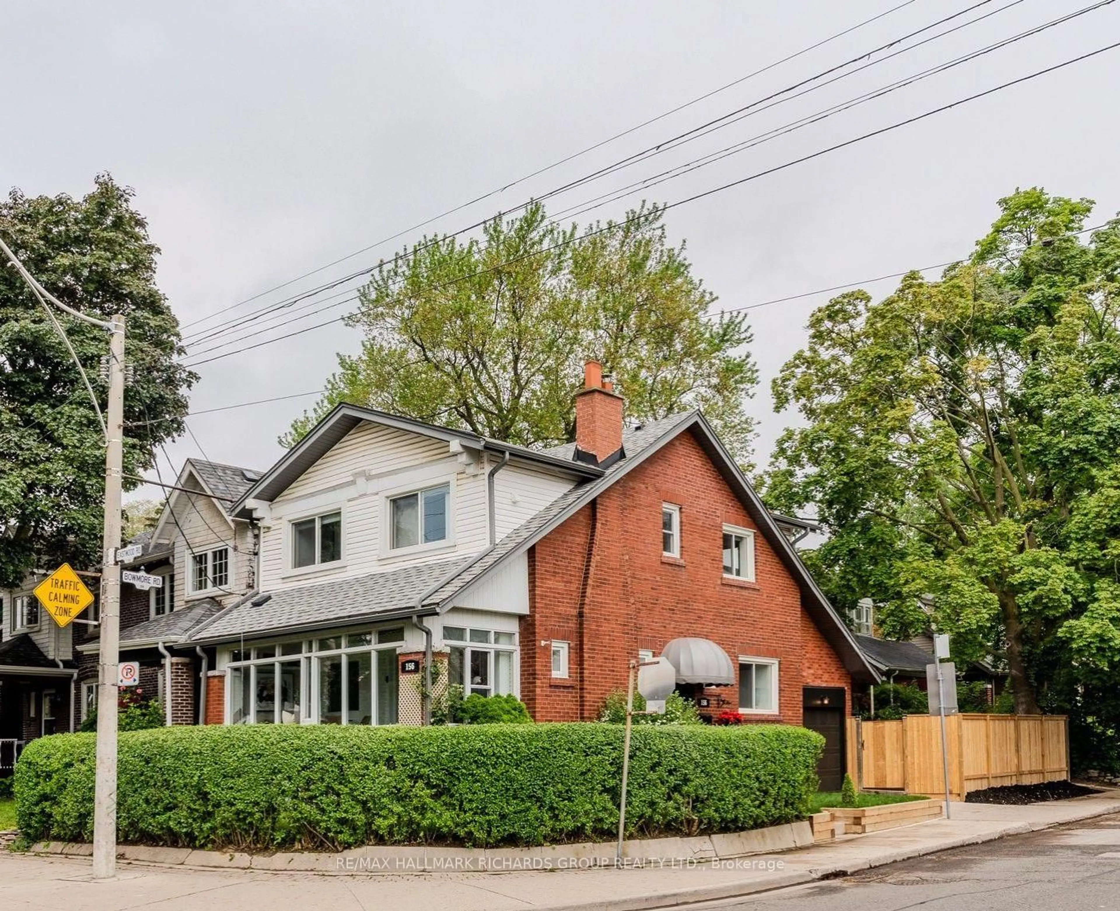 Home with brick exterior material, street for 156 Eastwood Rd, Toronto Ontario M4L 2C9