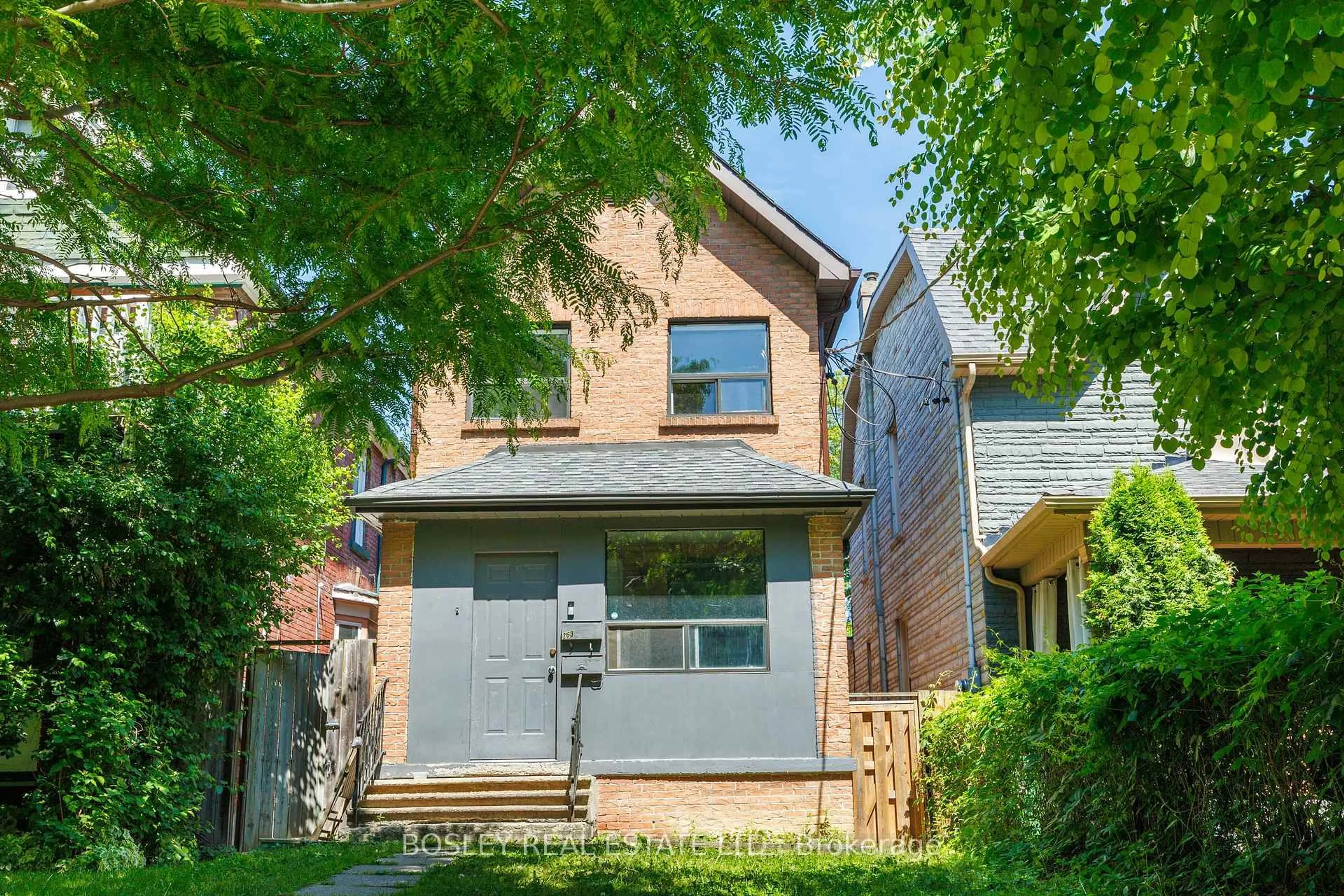Home with brick exterior material, street for 263 Leslie St, Toronto Ontario M4M 3C8