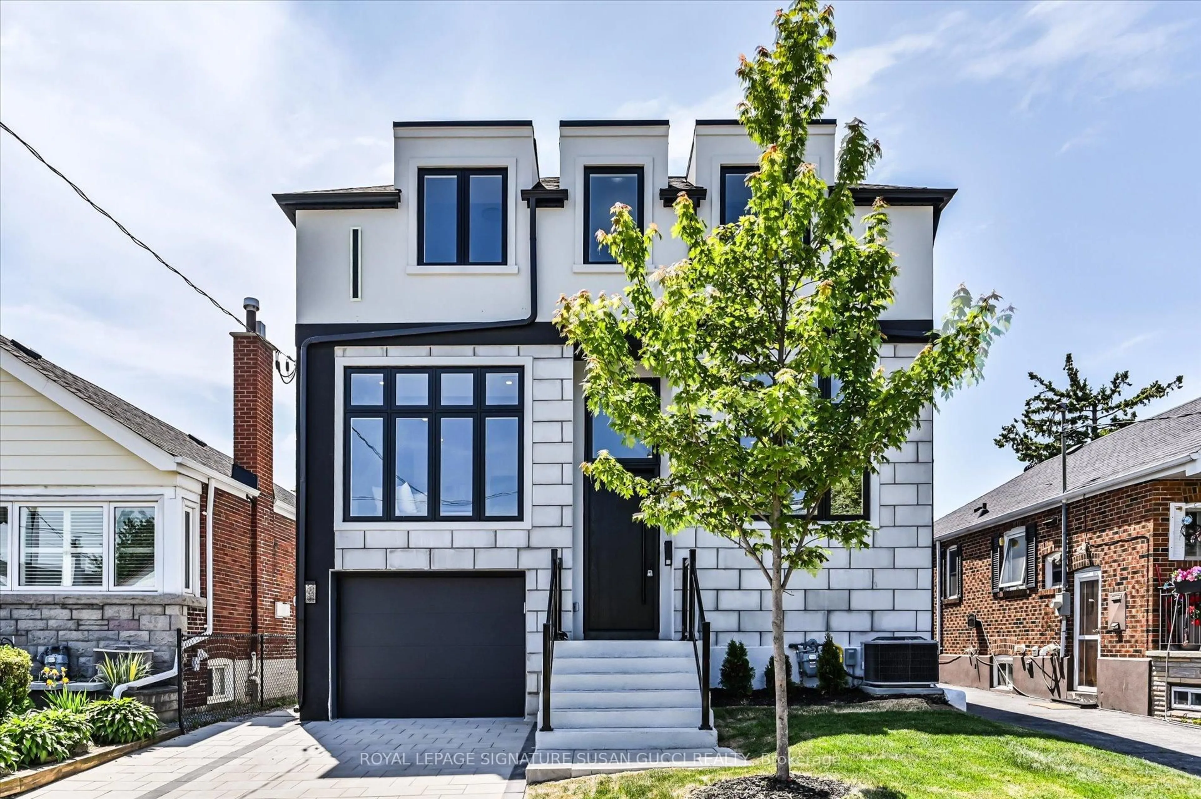 Home with brick exterior material, street for 354 Woodmount Ave, Toronto Ontario M4C 4A5