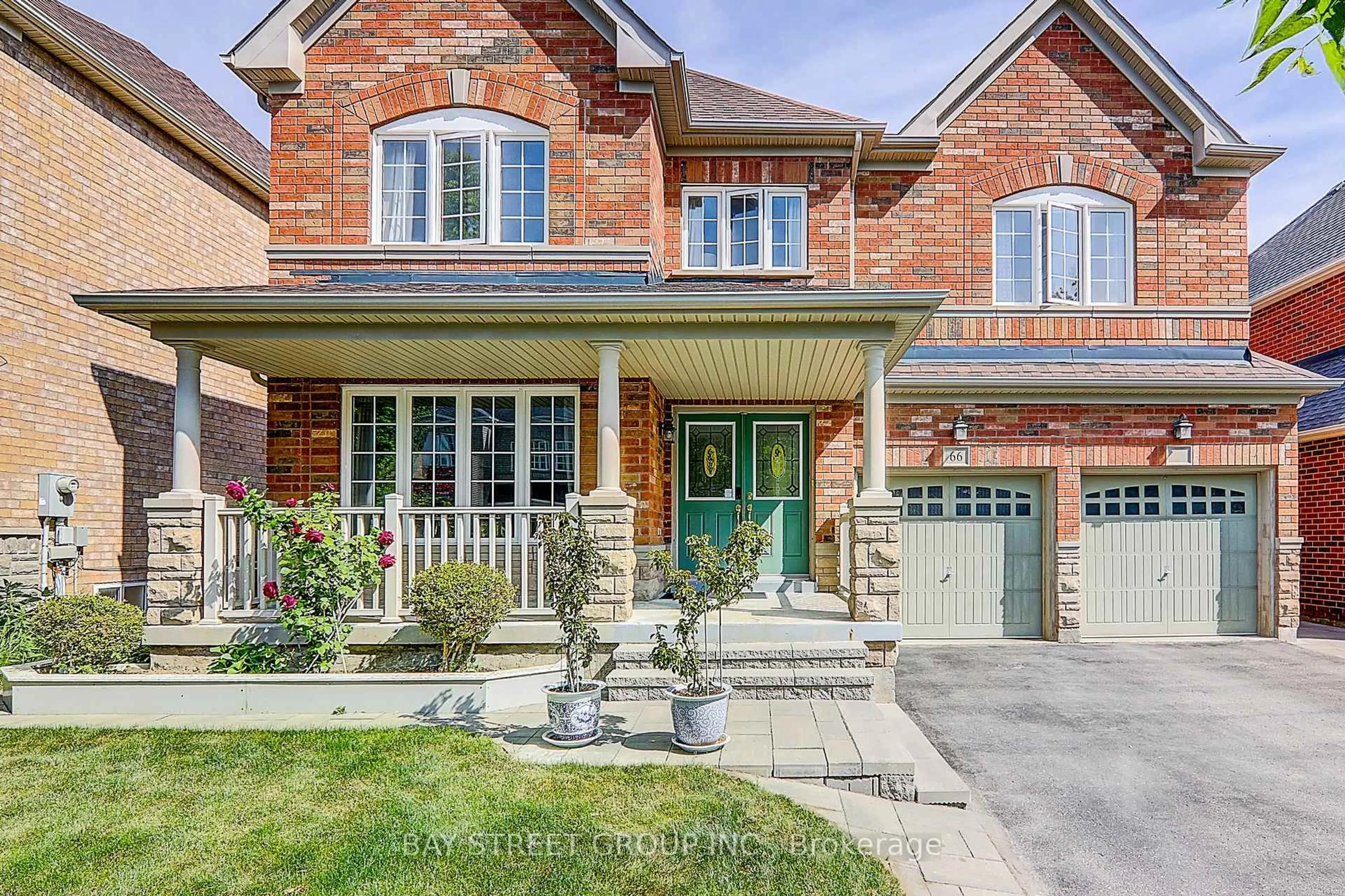 Home with brick exterior material, street for 66 Howlett Cres, Ajax Ontario L1T 0A6