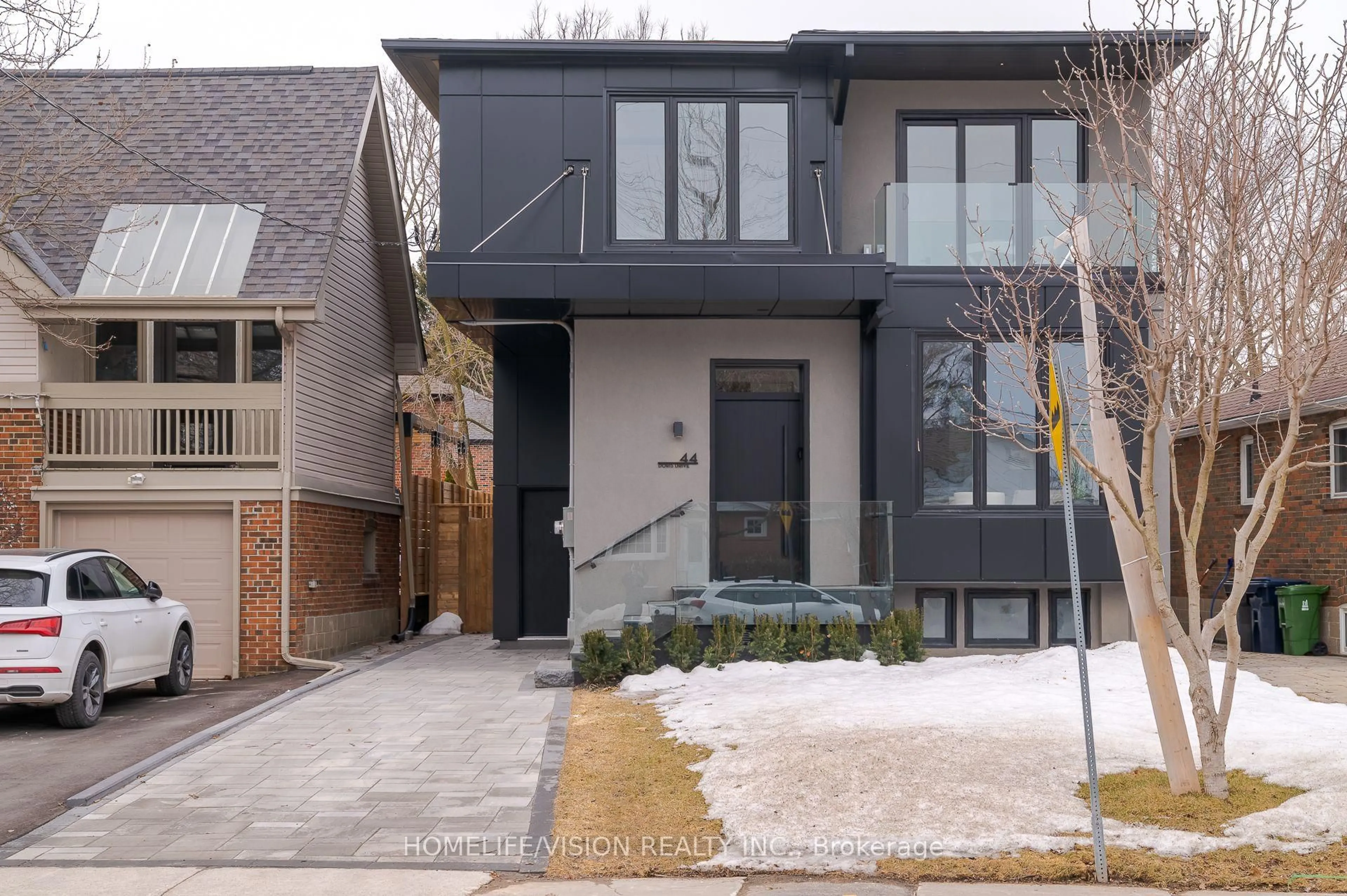 Home with brick exterior material, street for 44 Doris Dr, Toronto Ontario M4B 3C9