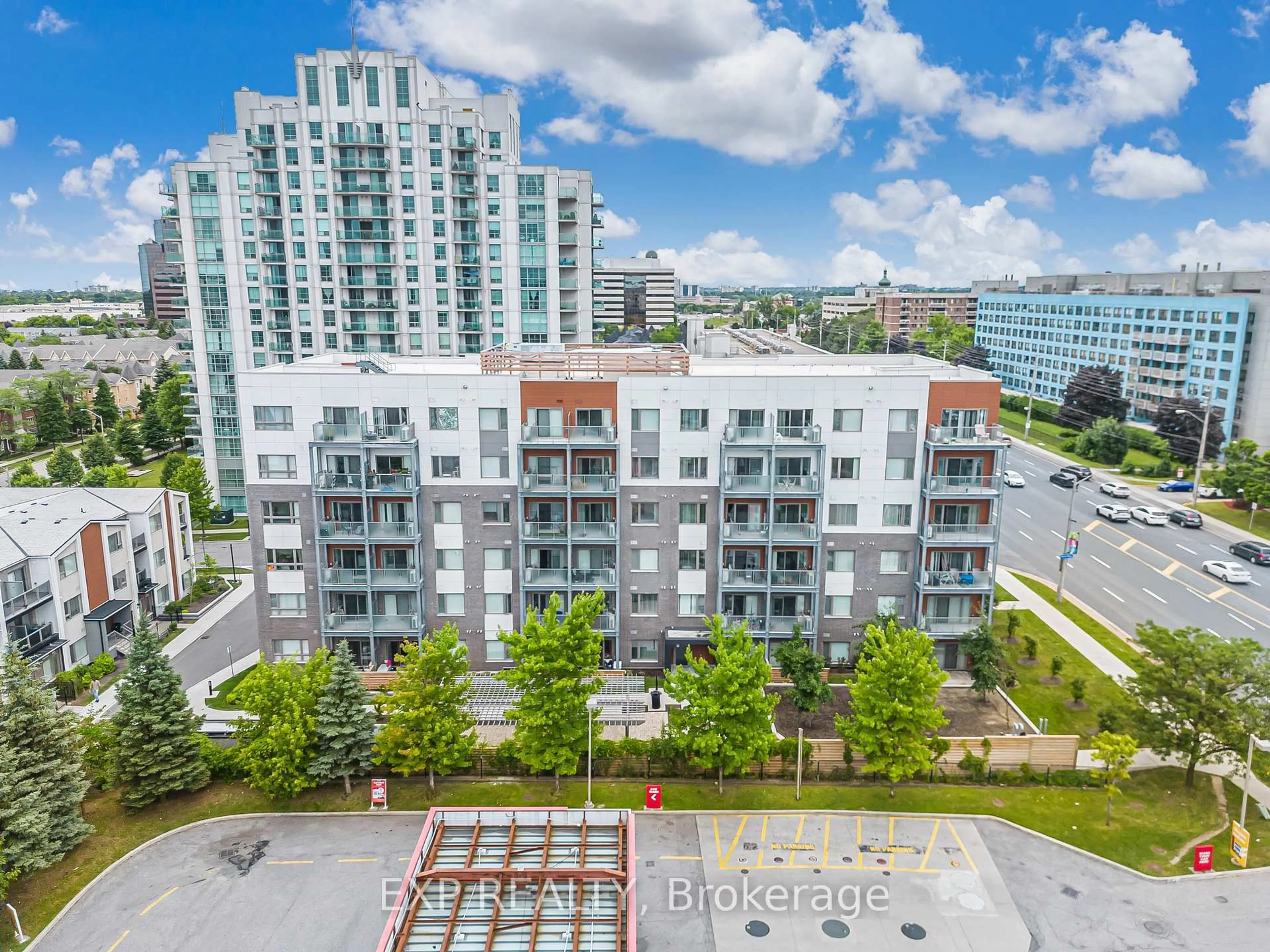 A pic from outside/outdoor area/front of a property/back of a property/a pic from drone, city buildings view from balcony for 20 Orchid Place Dr #404, Toronto Ontario M1B 0E1