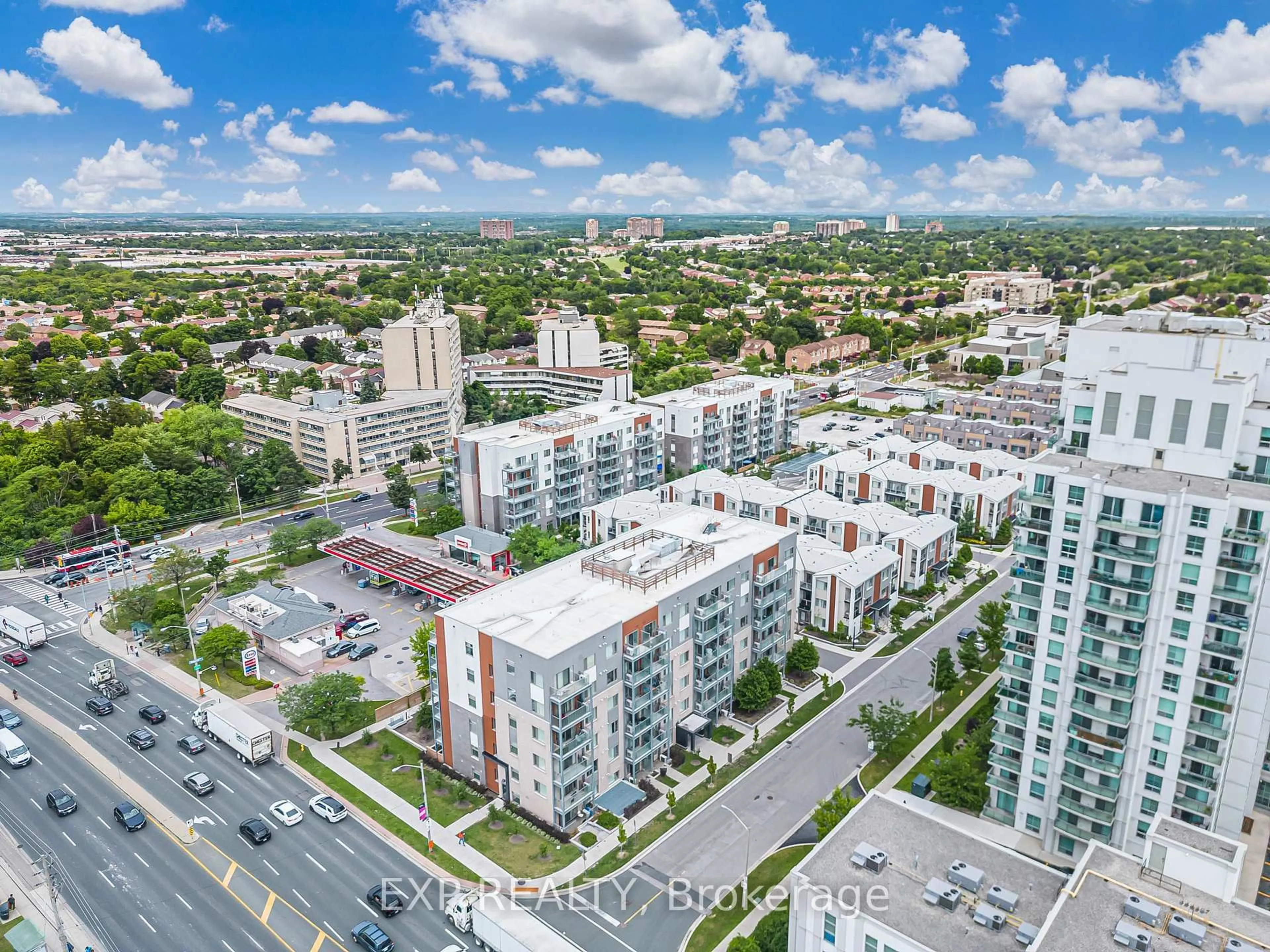 A pic from outside/outdoor area/front of a property/back of a property/a pic from drone, city buildings view from balcony for 20 Orchid Place Dr #404, Toronto Ontario M1B 0E1