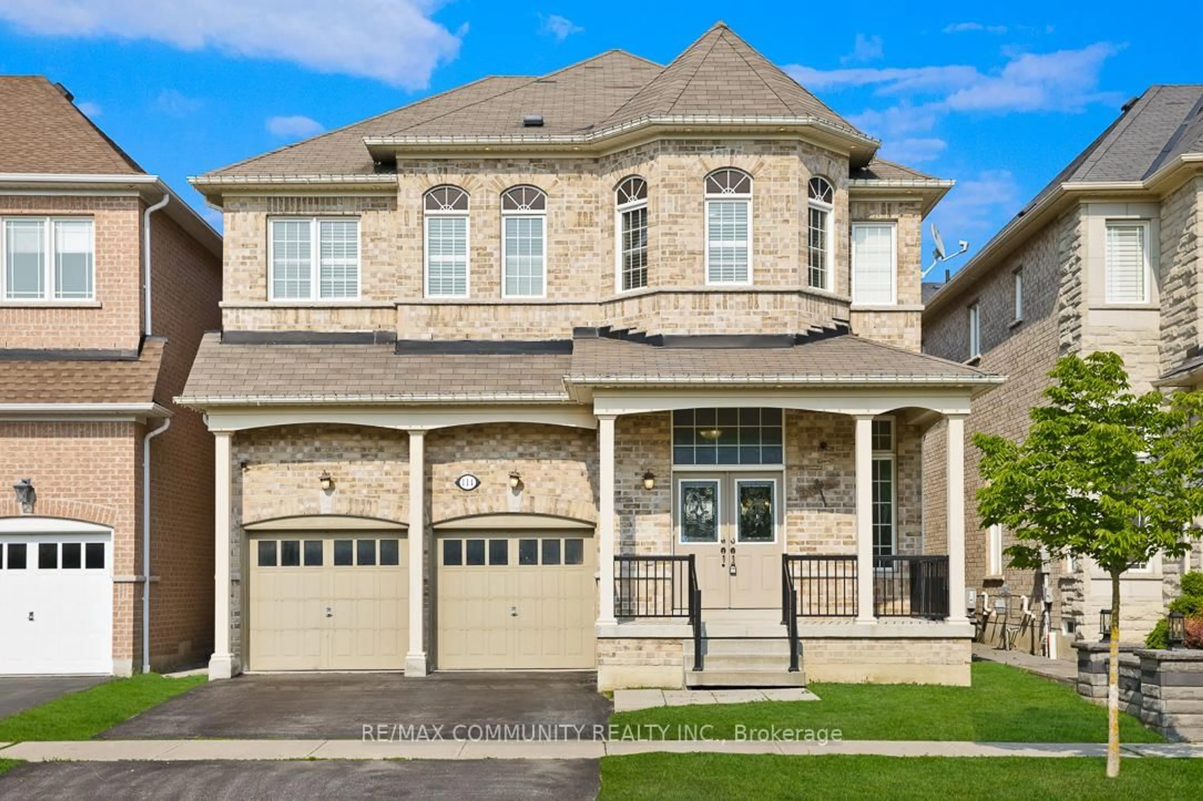 Home with brick exterior material, street for 114 Snowling Dr, Ajax Ontario L1Z 0G4