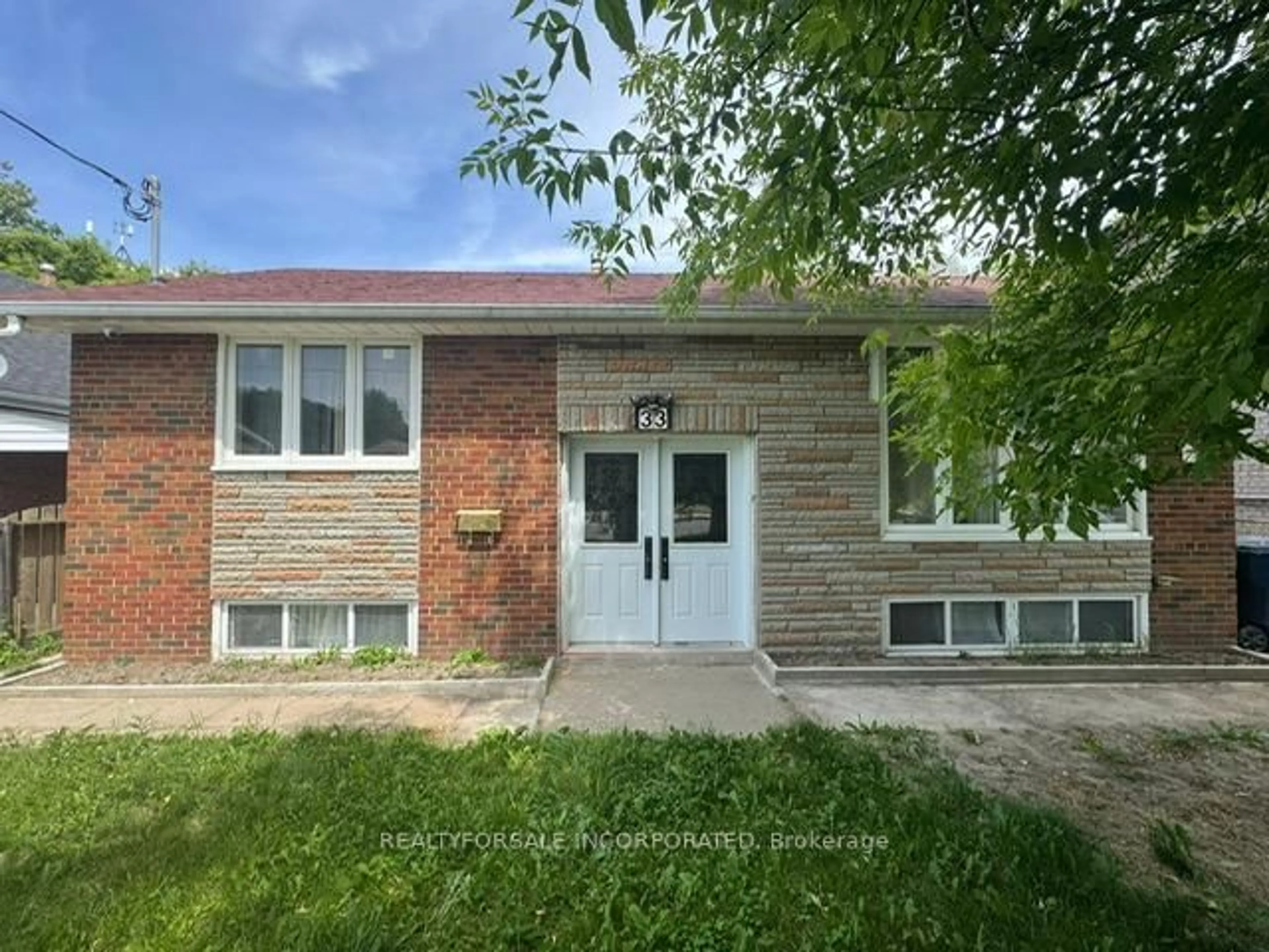 Home with brick exterior material, street for 33 Elfreda Blvd, Toronto Ontario M1L 4L5