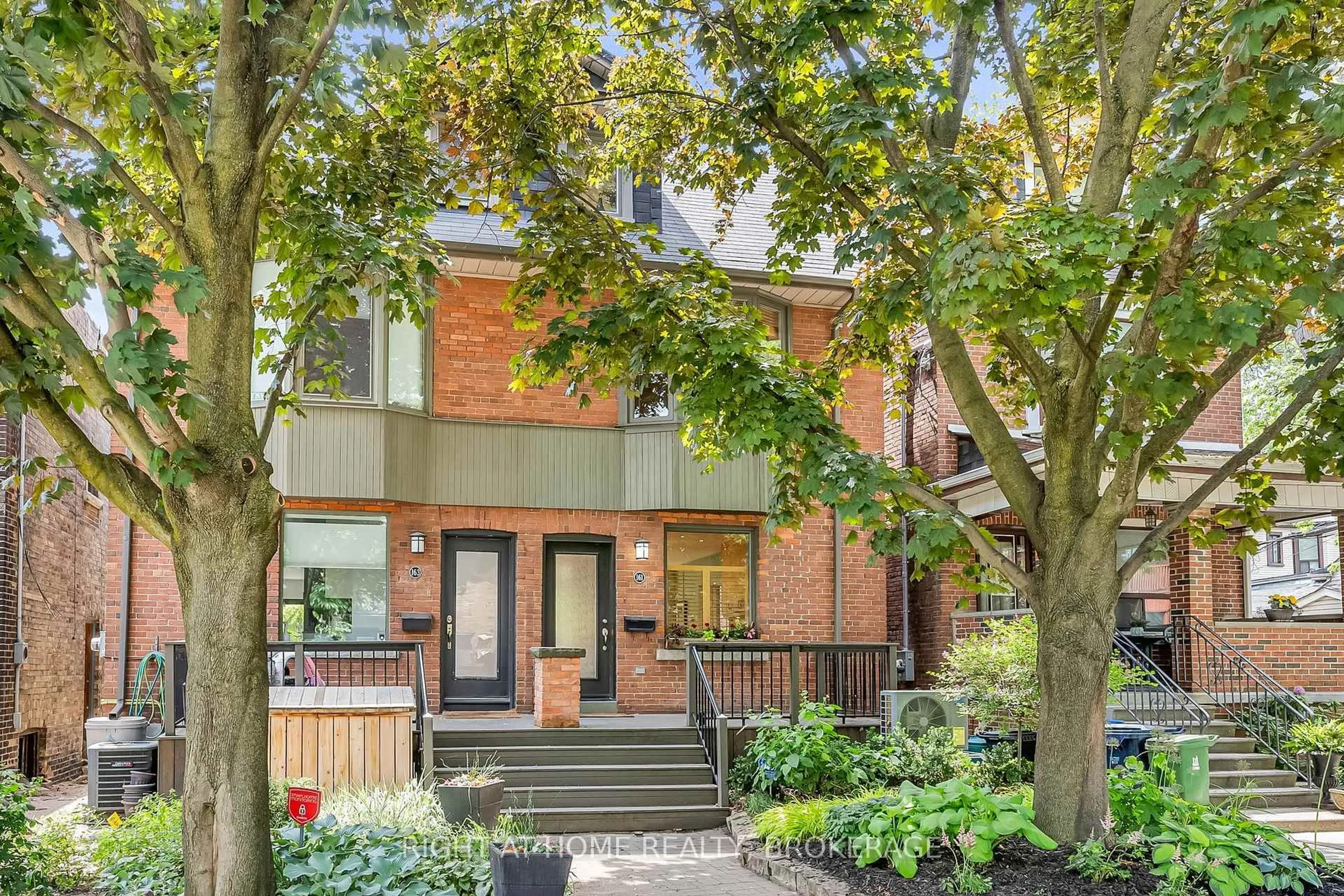 Home with brick exterior material, street for 161 Langley Ave, Toronto Ontario M4K 1B8