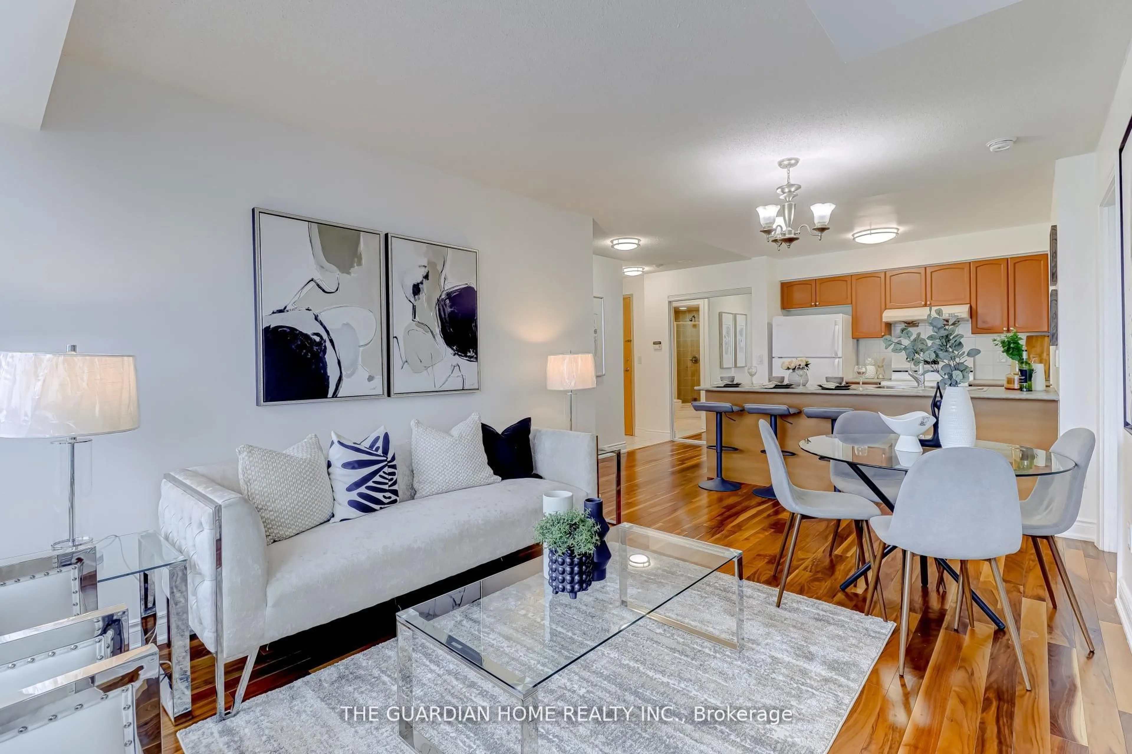 Living room with furniture, wood/laminate floor for 50 Brian Harrison Way #707, Toronto Ontario M1P 5J4