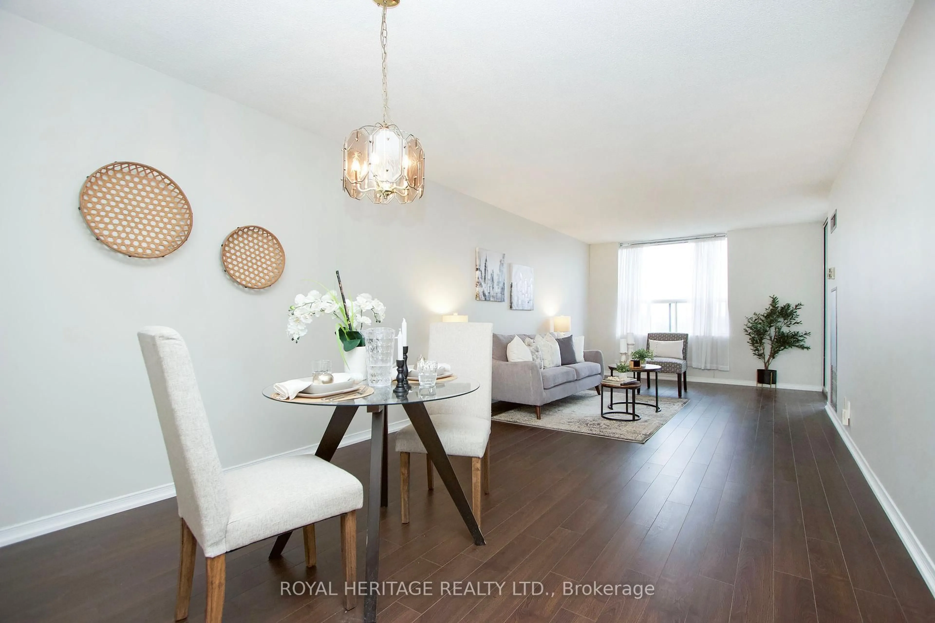 Living room with furniture, wood/laminate floor for 1665 Pickering Pkwy #412, Pickering Ontario L1V 6L4