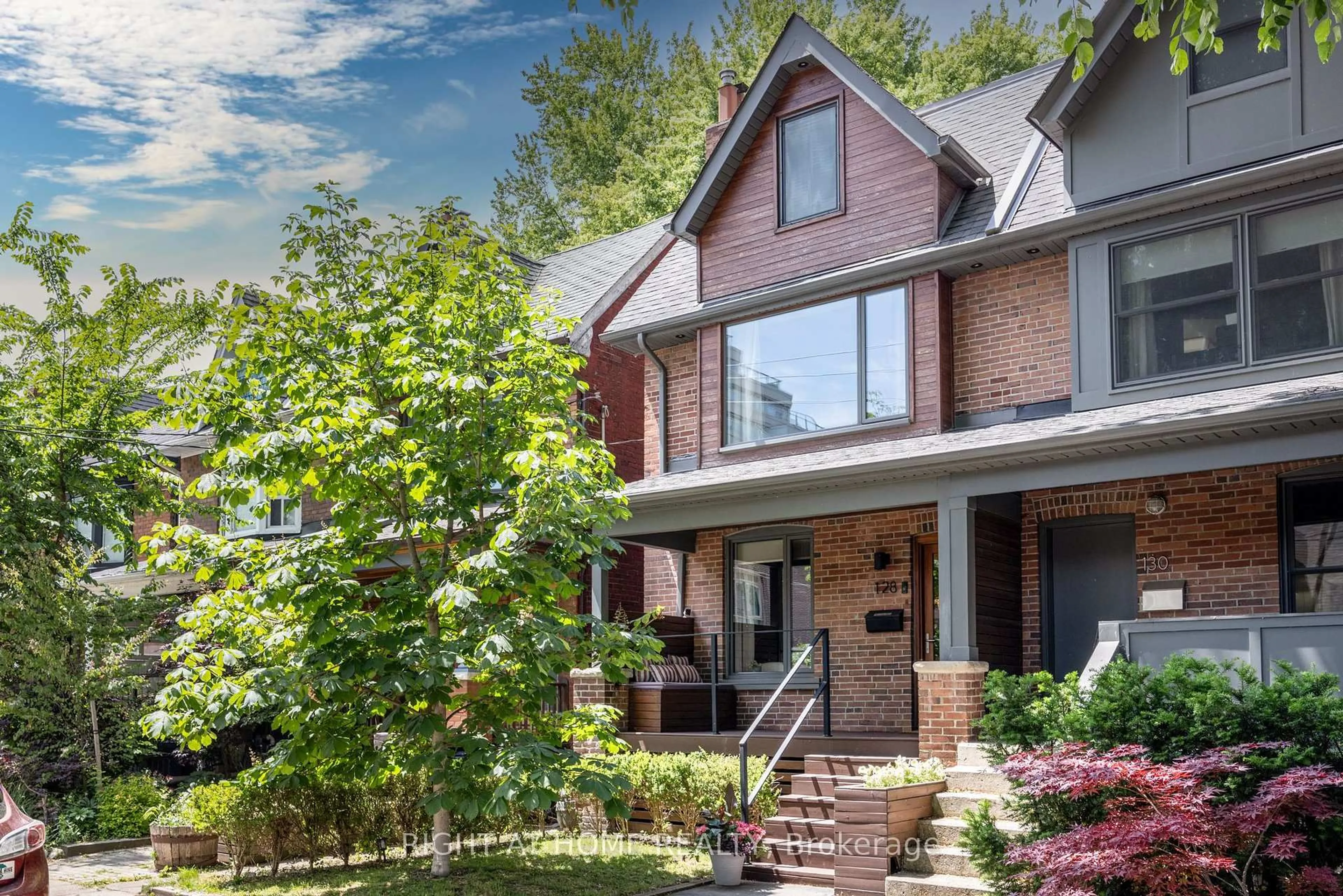 Home with brick exterior material, street for 128 Booth Ave, Toronto Ontario M4M 2M4