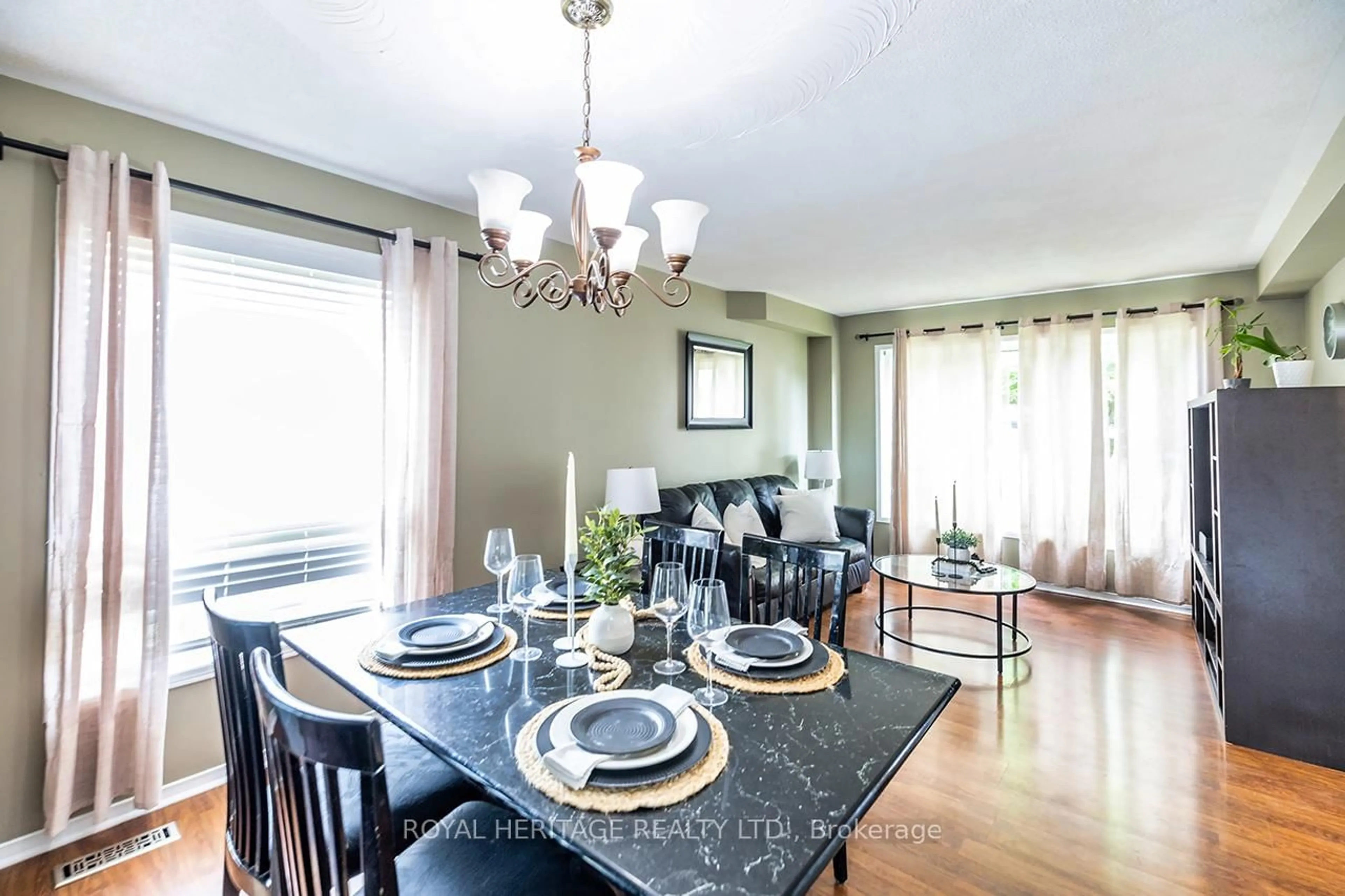 Dining room, wood/laminate floor for 15 Merryfield Crt, Clarington Ontario L1C 4L2
